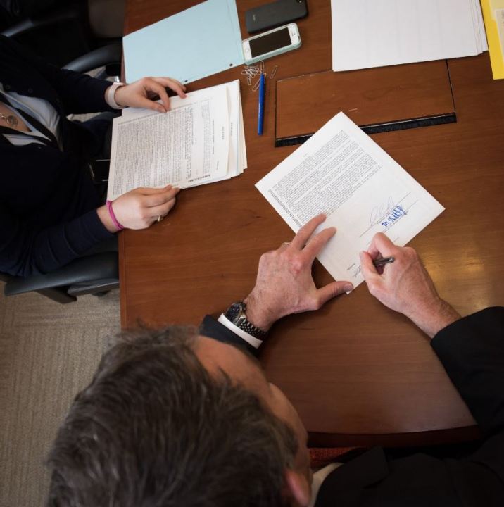 Governor Ralph Northam Signing Bill_1522873093332.JPG.jpg