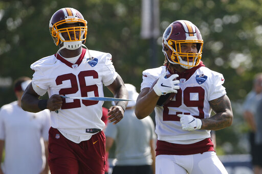 Derrius Guice, Adrian Peterson