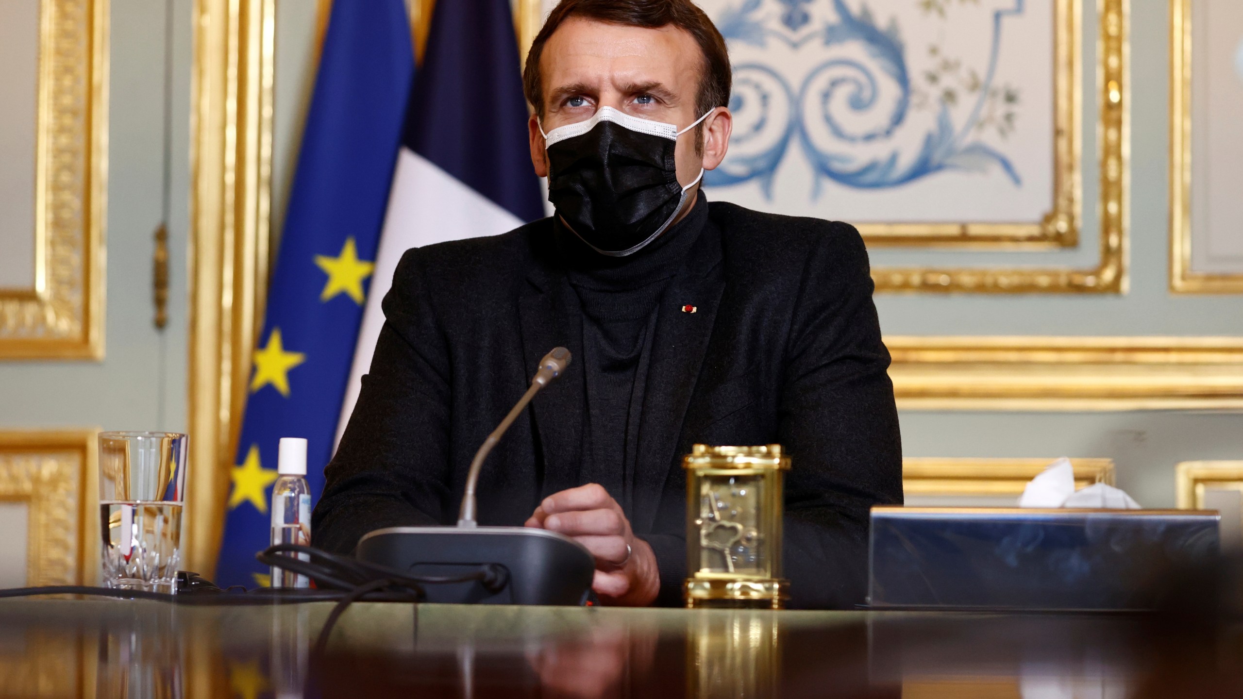 French President Macron attends a video-conference meeting with WHO Director-General Tedros Adhanom Ghebreyesus