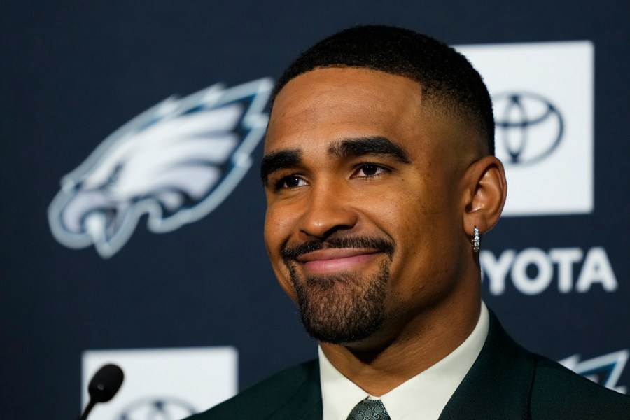 Philadelphia Eagles quarterback Jalen Hurts speaks with members of the media at the NFL football team's training facility in Philadelphia, Monday, April 24, 2023. (AP Photo/Matt Rourke)