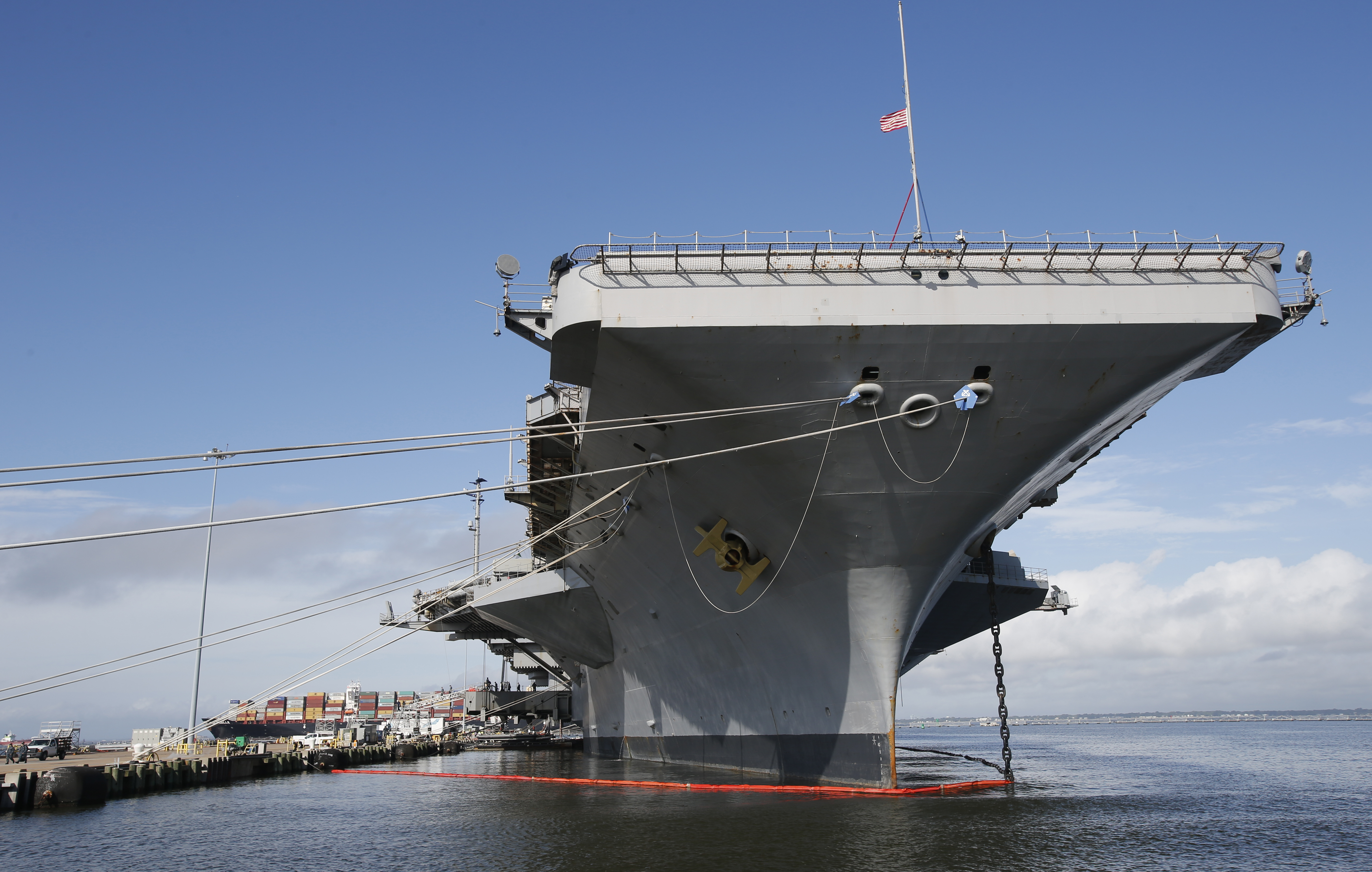 FILE - The nuclear aircraft carrier USS George Washington pier side at Norfolk Naval Station in Norfolk, Va., Sept. 30, 2016. A Navy investigation triggered by a series of suicides is recommending widespread improvements in housing, food, parking and internet for sailors, as well as changes to mental health and other personnel programs. The investigation began last year after seven service members assigned to the aircraft carrier USS George Washington died over a 12-month period ending April 2022, including three in one week. The carrier was docked for overhaul at Newport News shipyard. (AP Photo/Steve Helber, File)