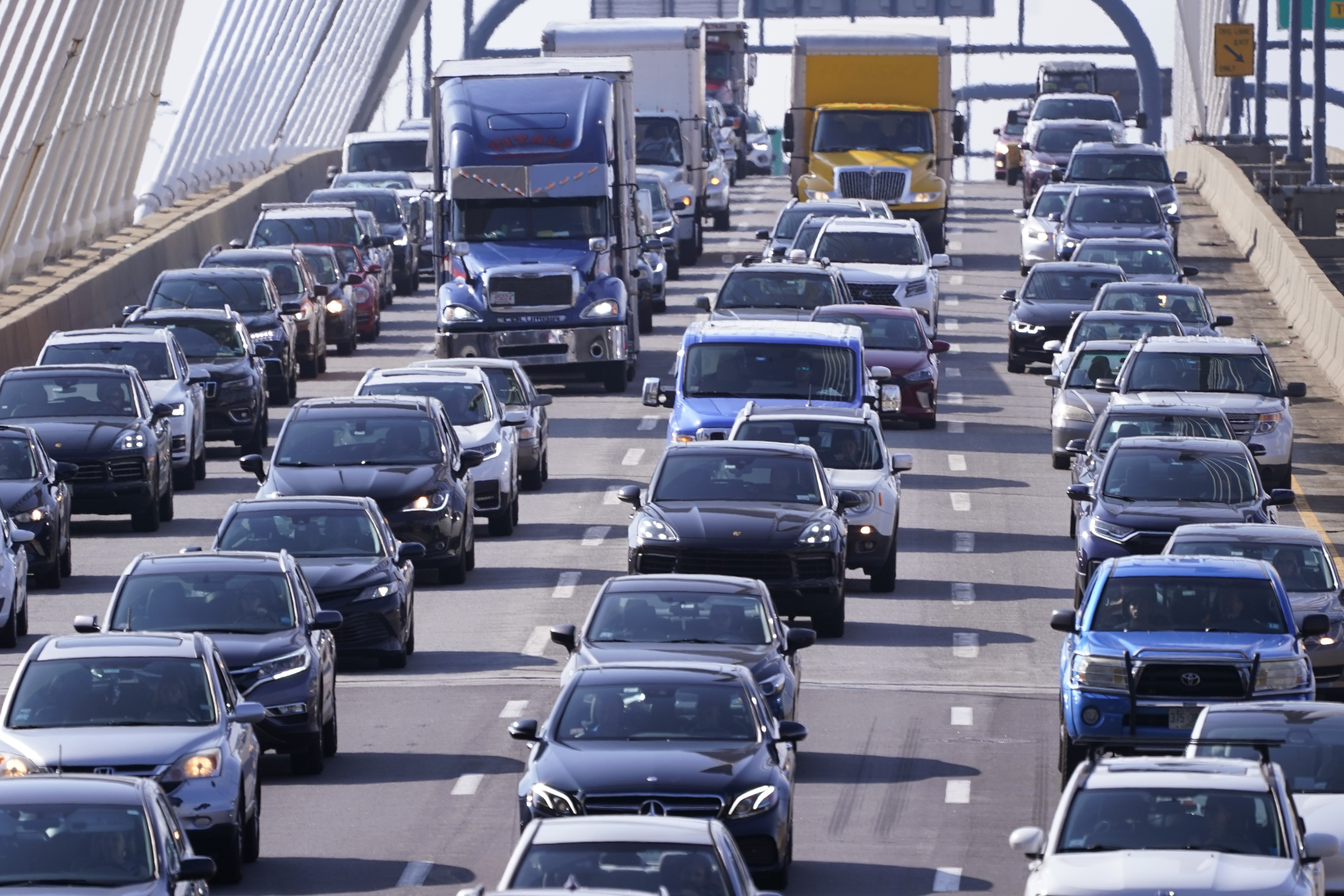 File - Automobile traffic jams Route 93 South, Wednesday, July 14, 2021, in Boston. More than 33 million people in the United States are driving vehicles that contain a potentially deadly threat: Airbag inflators that in rare cases can explode in a collision and spew shrapnel. (AP Photo/Charles Krupa, File)