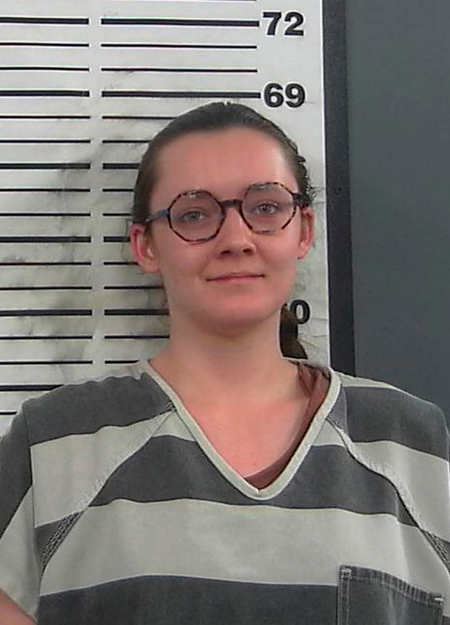 FILE - This booking photo provided by the Platte County Sheriff's Office shows Lorna Roxanne Green on March 23, 2023 in Wheatland, Wyo. The college student who authorities say admitted setting fire to a building being turned into Wyoming's only full-service abortion clinic is set to appear in federal court Friday, June 2, to enter a plea to an arson charge. (Platte County Sheriff's Office via AP, File)