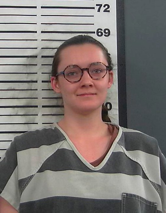 FILE - This booking photo provided by the Platte County Sheriff's Office shows Lorna Roxanne Green on March 23, 2023 in Wheatland, Wyo. The college student who authorities say admitted setting fire to a building being turned into Wyoming's only full-service abortion clinic is set to appear in federal court Friday, June 2, to enter a plea to an arson charge. (Platte County Sheriff's Office via AP, File)