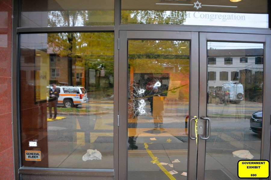 This photo of bullet damaged doors in the Tree of Life synagogue building in Pittsburgh was entered June 1, 2023, as a court exhibit by prosecutors in the federal trial of Robert Bowers. He faces multiple charges in the killing of 11 worshippers from three congregations and the wounding of seven worshippers and police officers in the building on Oct. 27, 2018. The charges include the obstruction of the free exercise of religion, resulting in death. (U.S. District Court for the Western District of Pennsylvania via AP)