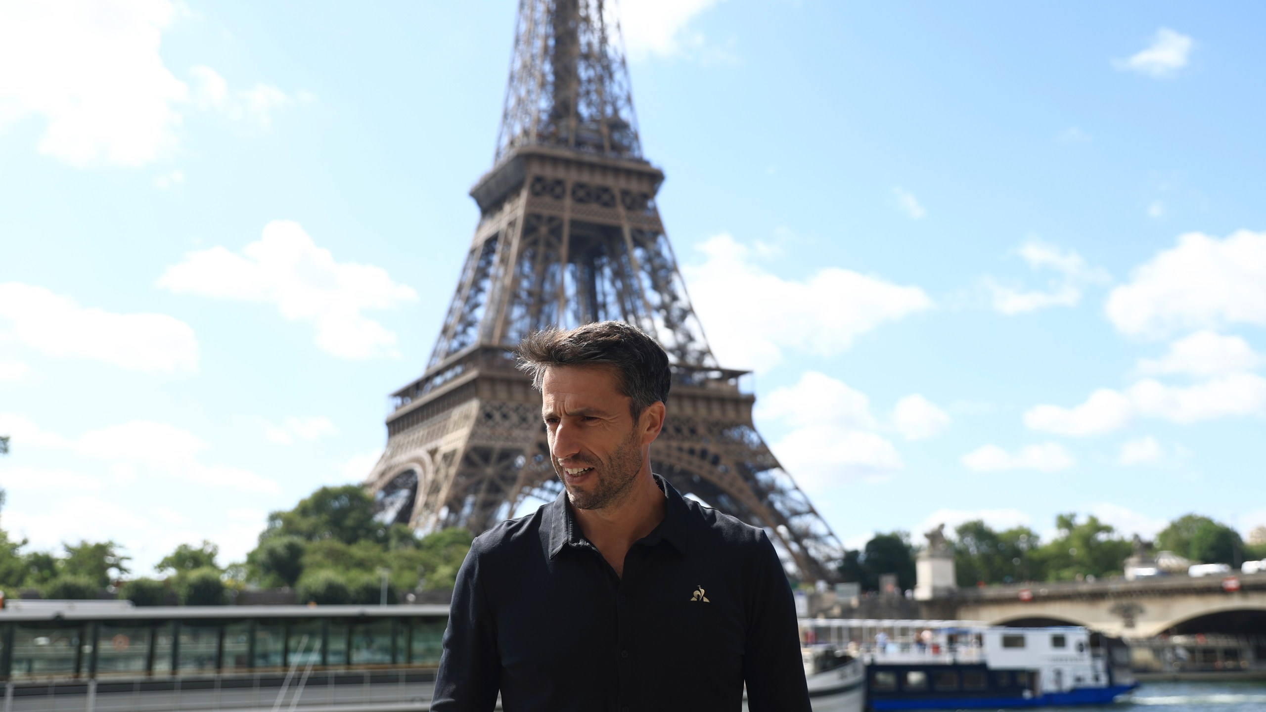 Paris 2024 Olympics Organizing Committee President Tony Estanguet poses after a test for the Paris 2024 Olympic Games opening ceremony, Monday, July 17, 2023 in Paris. Thousands of Olympic athletes on boats will cruise along the River Seine for the Paris 2024 Olympic Games on July 26, 2024.(AP Photo/Aurelien Morissard)