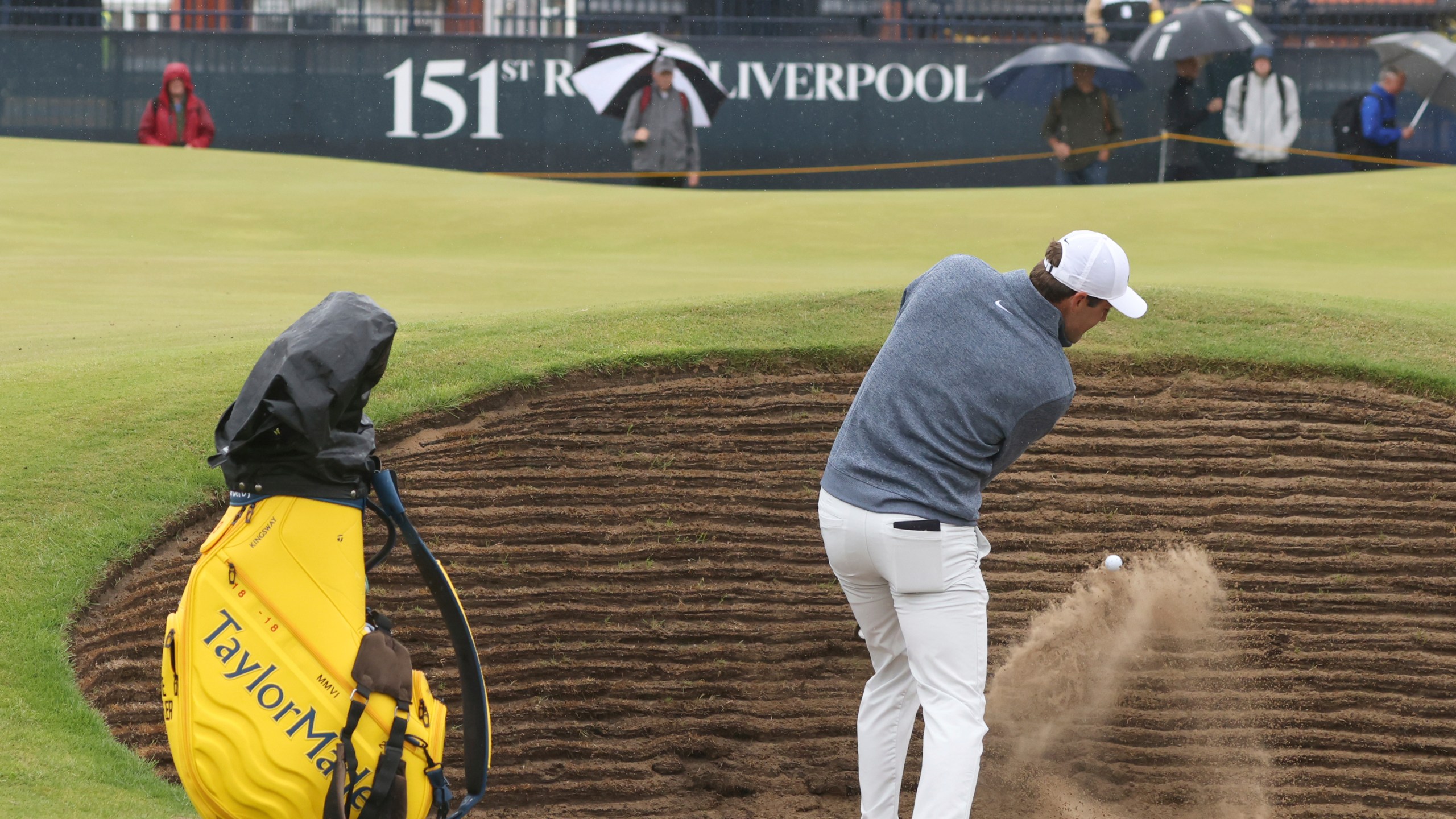 United States' Scottie Scheffler plays out of a bunker on the 2nd green during a practice round for the British Open Golf Championships at the Royal Liverpool Golf Club in Hoylake, England, Tuesday, July 18, 2023. The Open starts Thursday, July 20. (AP Photo/Peter Morrison)