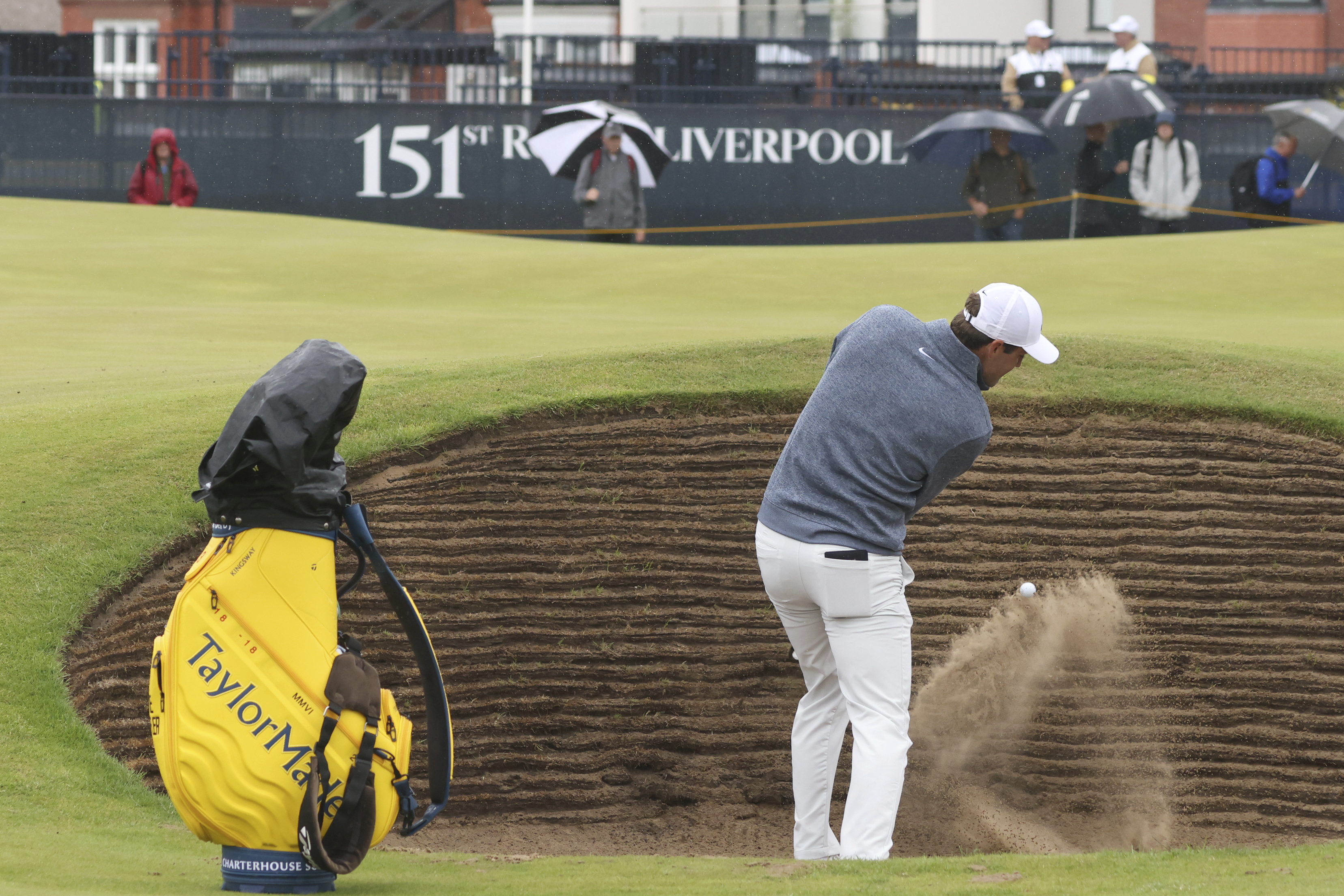 United States' Scottie Scheffler plays out of a bunker on the 2nd green during a practice round for the British Open Golf Championships at the Royal Liverpool Golf Club in Hoylake, England, Tuesday, July 18, 2023. The Open starts Thursday, July 20. (AP Photo/Peter Morrison)