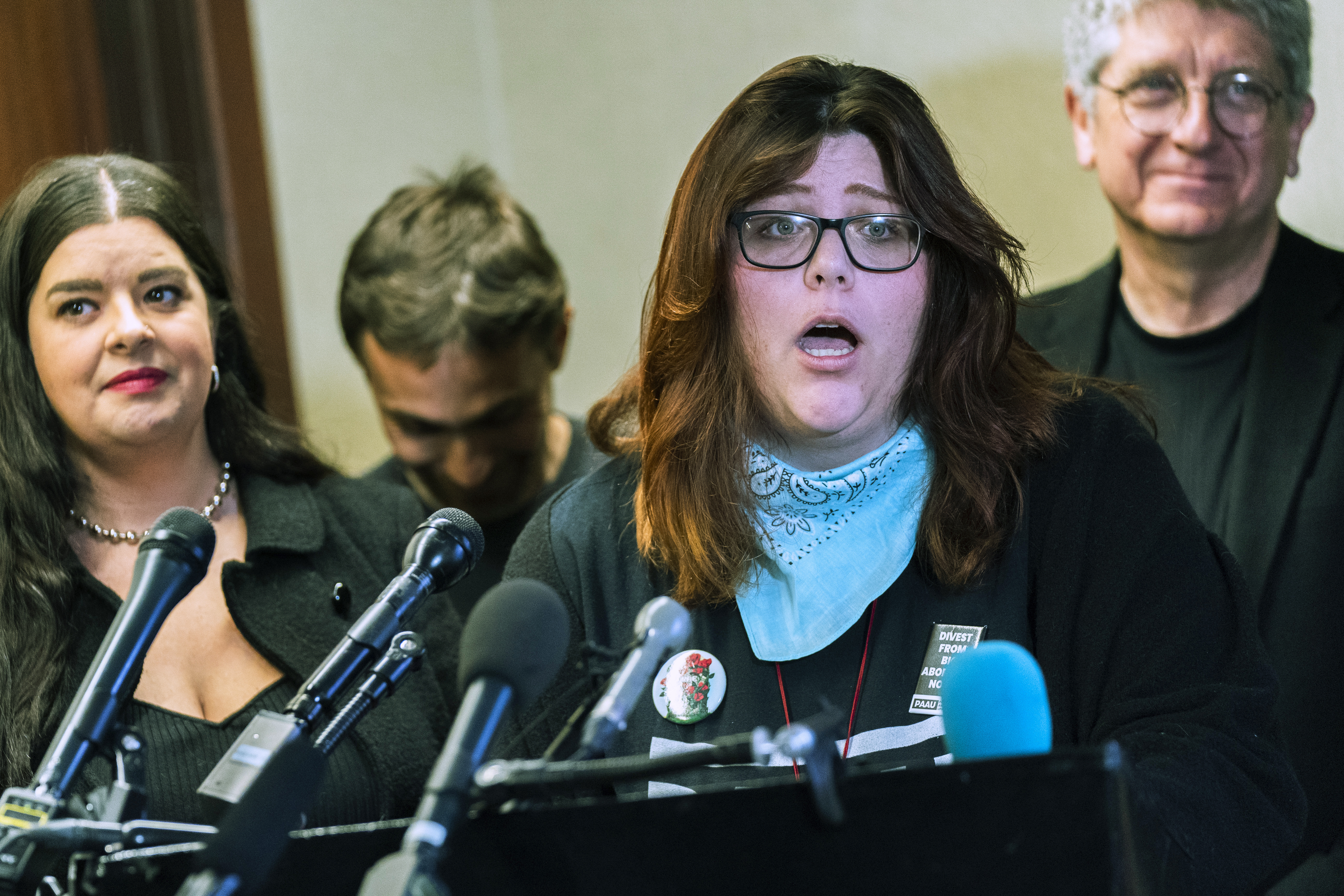 FILE - Anti-abortion activists Lauren Handy, front, with Terrisa Bukovinac, from left, Jonathan Darnell, and Randall Terry, speak during a news conference in Washington, April 5, 2022. Five anti-abortion activists, including Handy, a woman who was discovered to have five fetuses in her home, were convicted Tuesday, Aug. 29, 2023, of illegally blocking a reproductive clinic in Washington, The Washington Post reported. (AP Photo/Manuel Balce Ceneta, File)