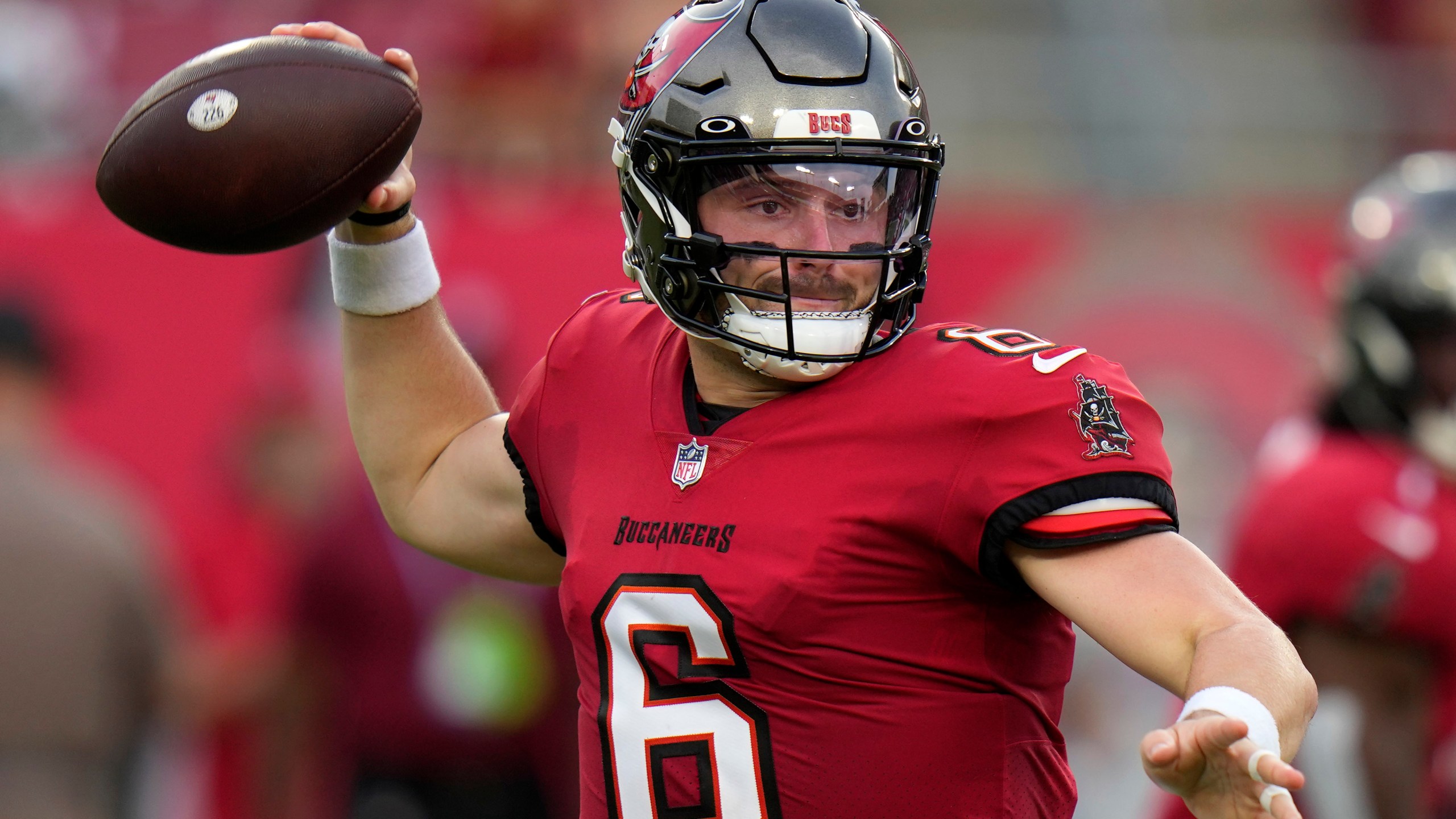 Tampa Bay Buccaneers quarterback Baker Mayfield passes during the first half of an NFL preseason football game against the Baltimore Ravens Saturday, Aug. 26, 2023, in Tampa, Fla. (AP Photo/Chris O'Meara)