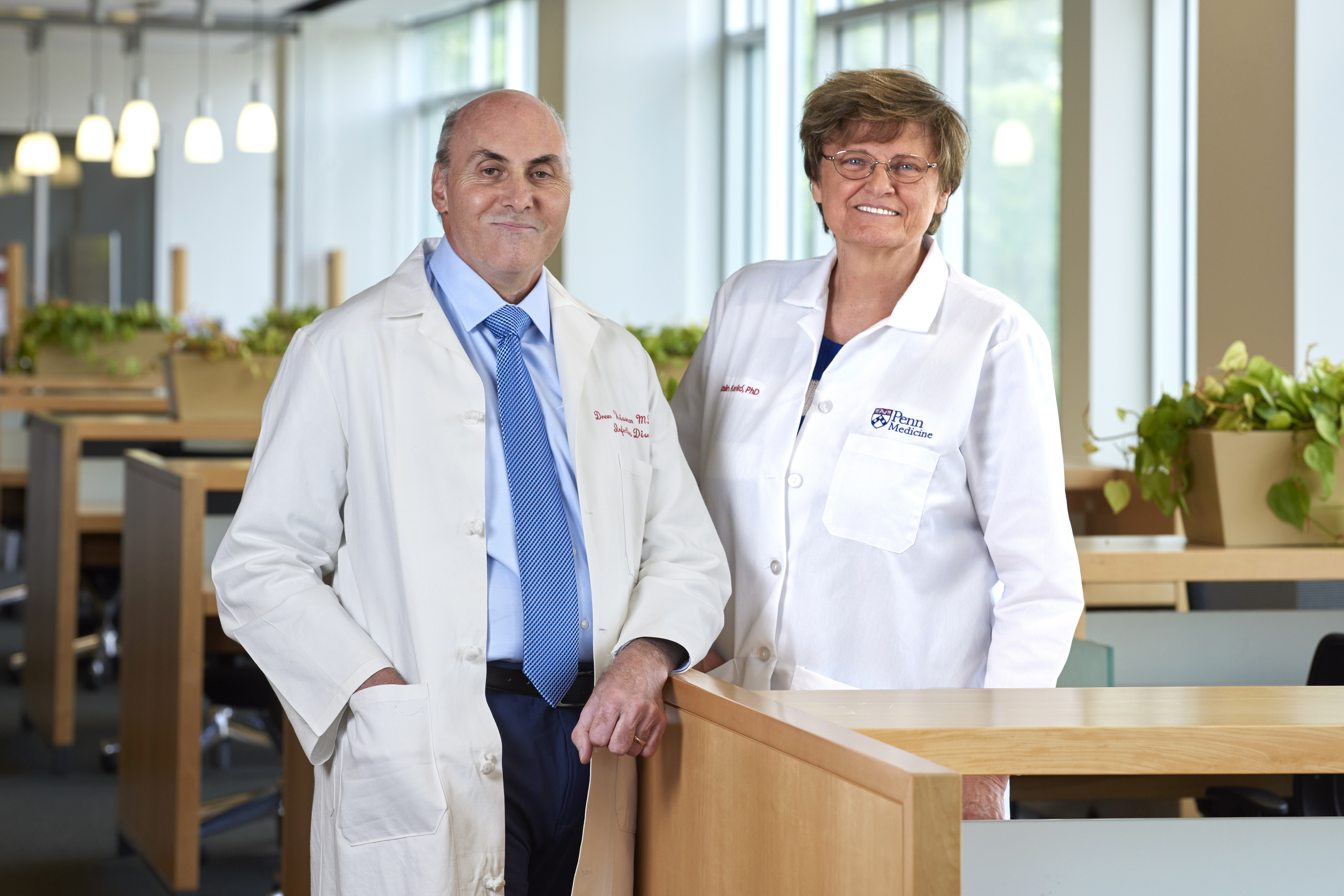 In this undated image provided by Penn Medicine, Katalin Karikó and Drew Weissman pose for a photo at the University of Pennsylvania in Philadelphia. Karikó and Weissman won the Nobel Prize in medicine on Monday, Oct. 2, 2023, for discoveries that enabled the creation of mRNA vaccines against COVID-19 and that could be used to develop other shots in the future. (Peggy Peterson Photography/Penn Medicine via AP)