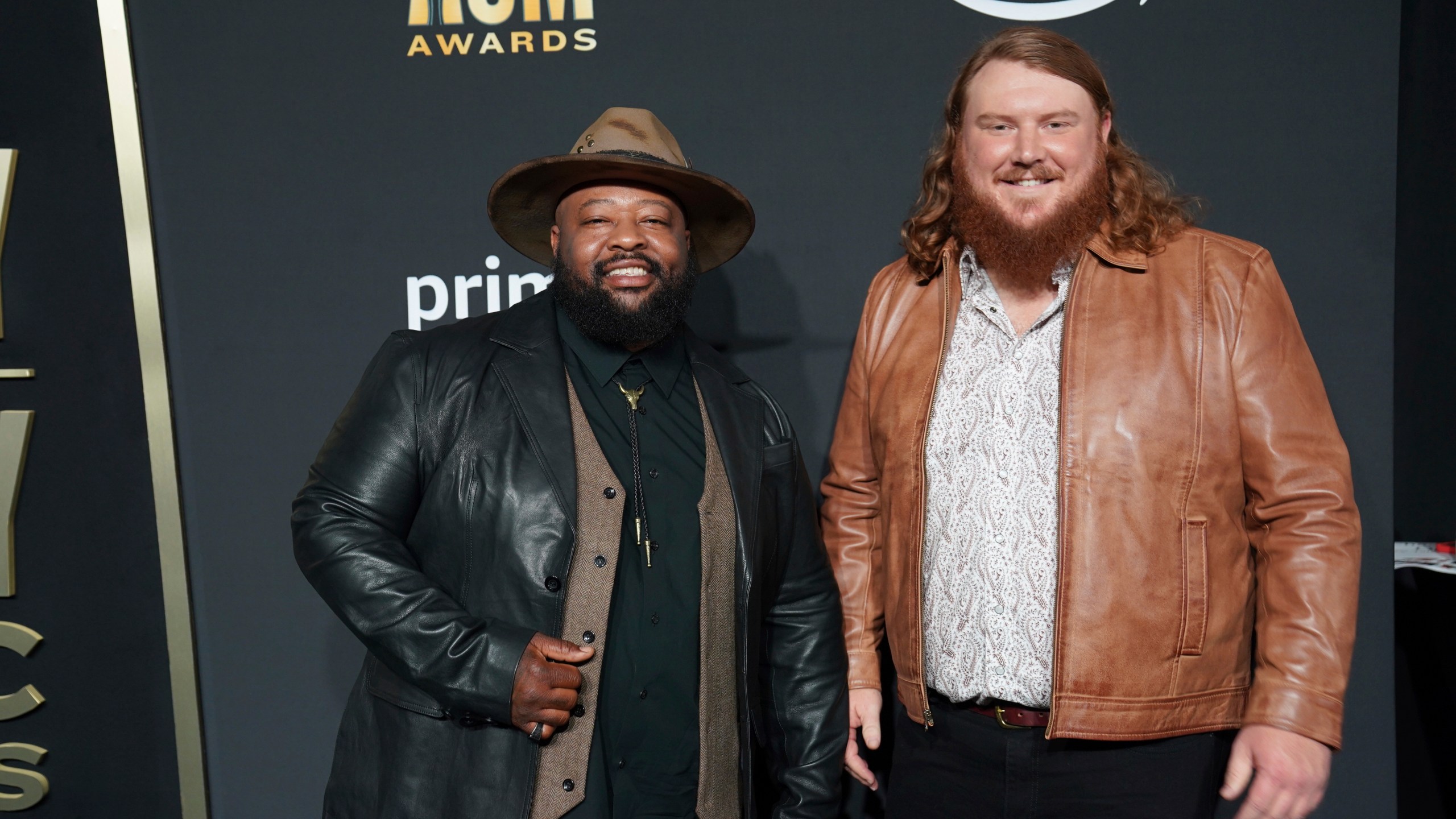 FILE - Leo Brooks, left, and Andrew Millsaps of Neon Union arrive at the 58th annual Academy of Country Music Awards, May 11, 2023, at the Ford Center in Frisco, Texas. Neon Union will be performing at the Country Bay Music Festival, which is scheduled for Saturday, Nov. 11, and Sunday, Nov. 12, at the historic Miami Marine Stadium, just southeast of downtown on Virginia Key in Biscayne Bay, Fla. (AP Photo/Jeffrey McWhorter, File)