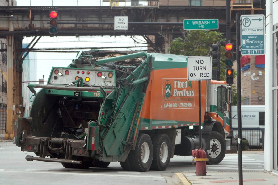 A commercial vehicle makes a right turn on red at an intersection that prohibits the turn Tuesday, Oct. 31, 2023, in Chicago. A dramatic rise in accidents killing or injuring pedestrians and bicyclists has led to a myriad of policy and infrastructure changes, but moves to ban right on red have drawn some of the most intense sentiments on both sides. (AP Photo/Charles Rex Arbogast)