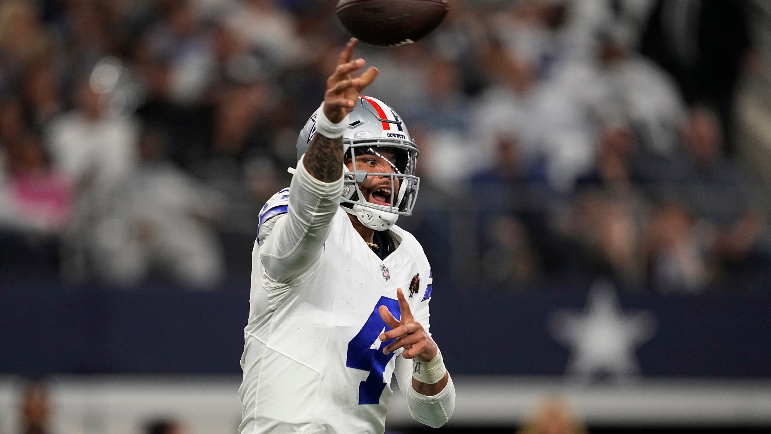 Dallas Cowboys quarterback Dak Prescott (4) throws in the second half of an NFL football game against the New York Giants, Sunday, Nov. 12, 2023, in Arlington, Texas. (AP Photo/Tony Gutierrez)