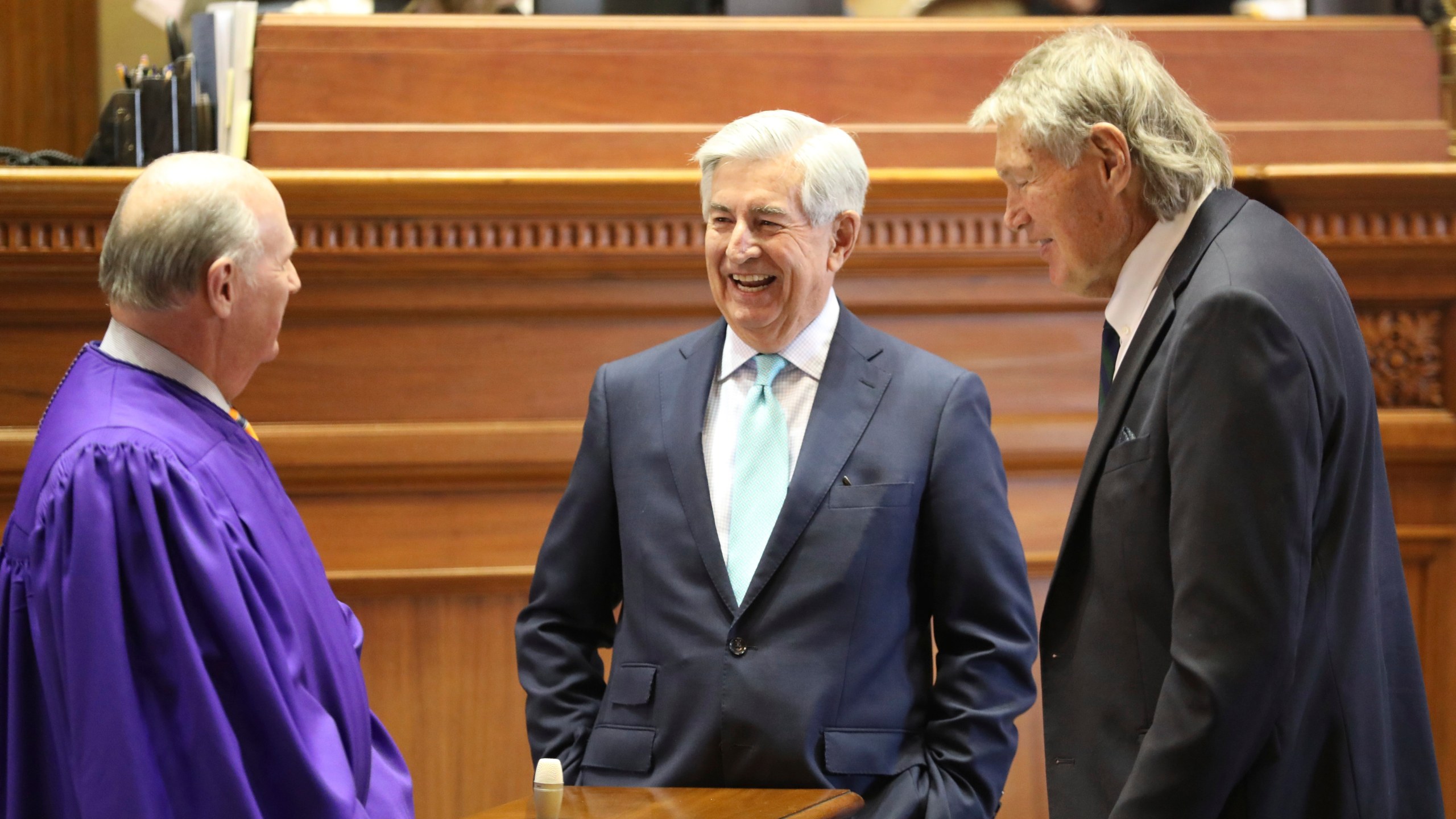 South Carolina Sen. Nikki Setzler, D-West Columbia, center, talks to Senate President Thomas Alexander, R-Walhalla, left, and Sen. Harvey Peeler, R-Gaffney, right before the session begins on Wednesday, Jan. 10, 2024, in Columbia, South Carolina. Setzler is retiring after 48 years in the state Senate and is currently the longest serving state senator in the U.S. (AP Photo/Jeffrey Collins)