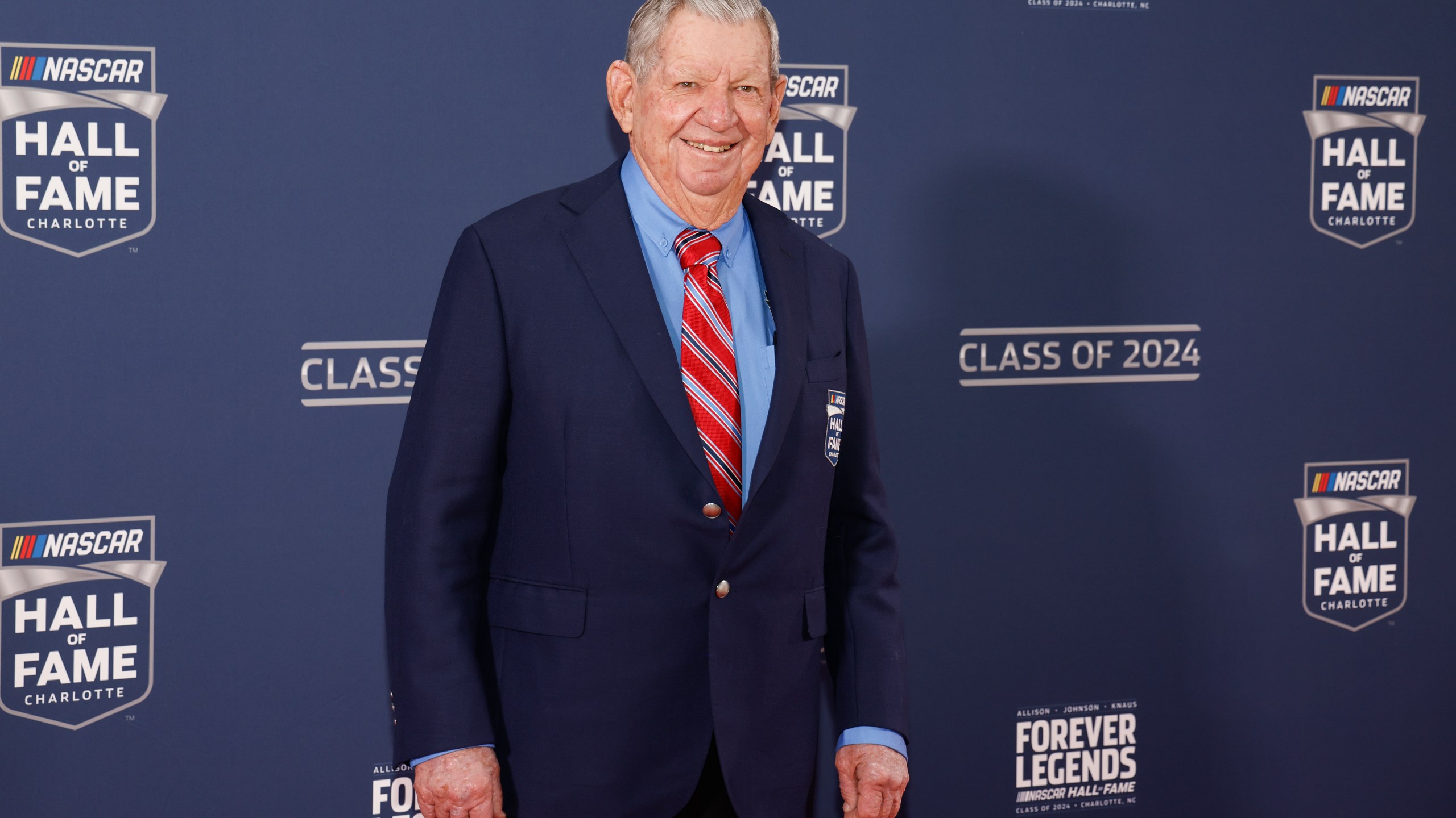 Donnie Allison poses for photographers as he arrives for his induction into the NASCAR Hall of Fame in Charlotte, N.C., Friday, Jan. 19, 2024. (AP Photo/Nell Redmond)