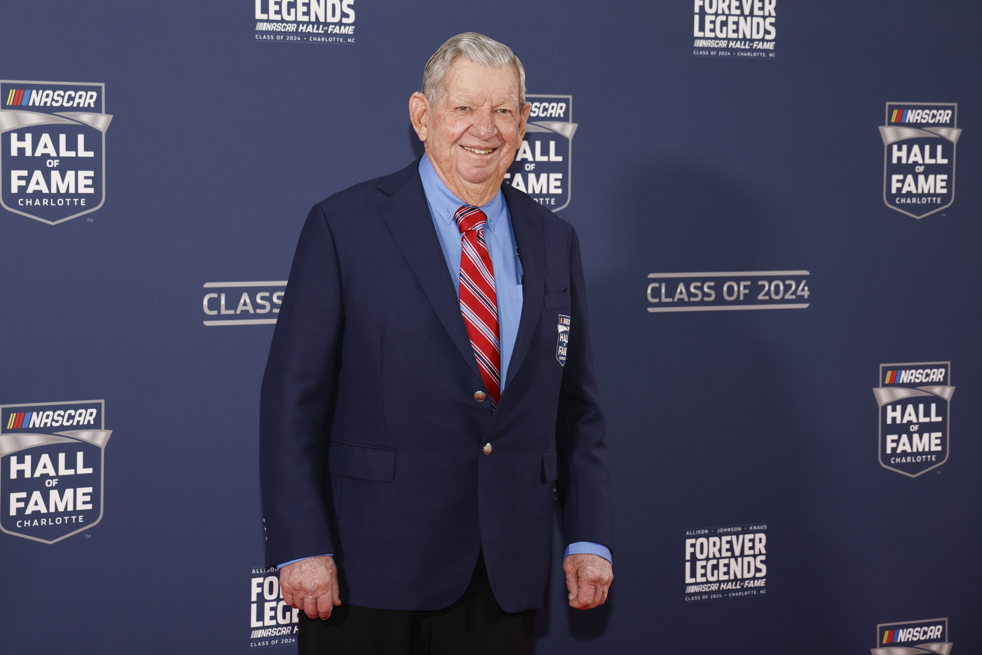 Donnie Allison poses for photographers as he arrives for his induction into the NASCAR Hall of Fame in Charlotte, N.C., Friday, Jan. 19, 2024. (AP Photo/Nell Redmond)