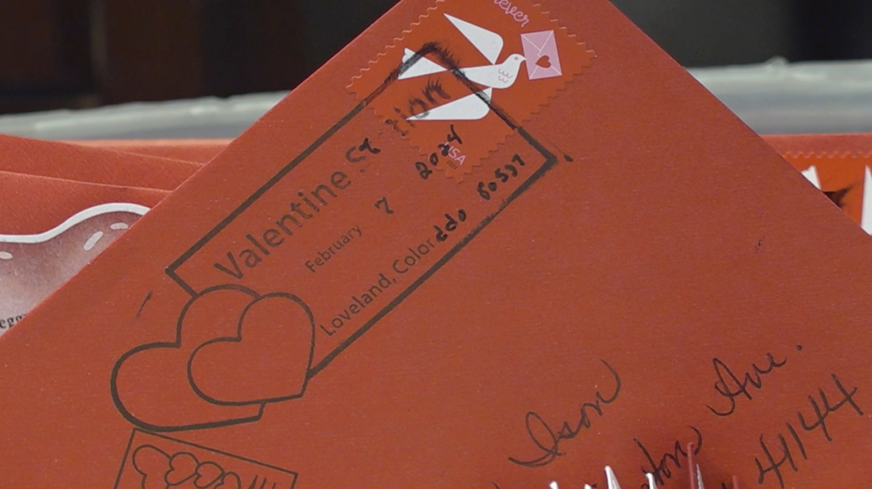 A special cancellation postmark is seen on a Valentine’s Day card in Loveland, Colo., on Wednesday, Feb. 7, 2024. Every year, tens of thousands of people from around the world route their Valentine’s Day cards to the “Sweetheart City” to get an inscription and the coveted Loveland postmark. The re-mailing tradition has been going on for nearly 80 years and is the largest of its kind in the world. (AP Photo/Thomas Peipert)