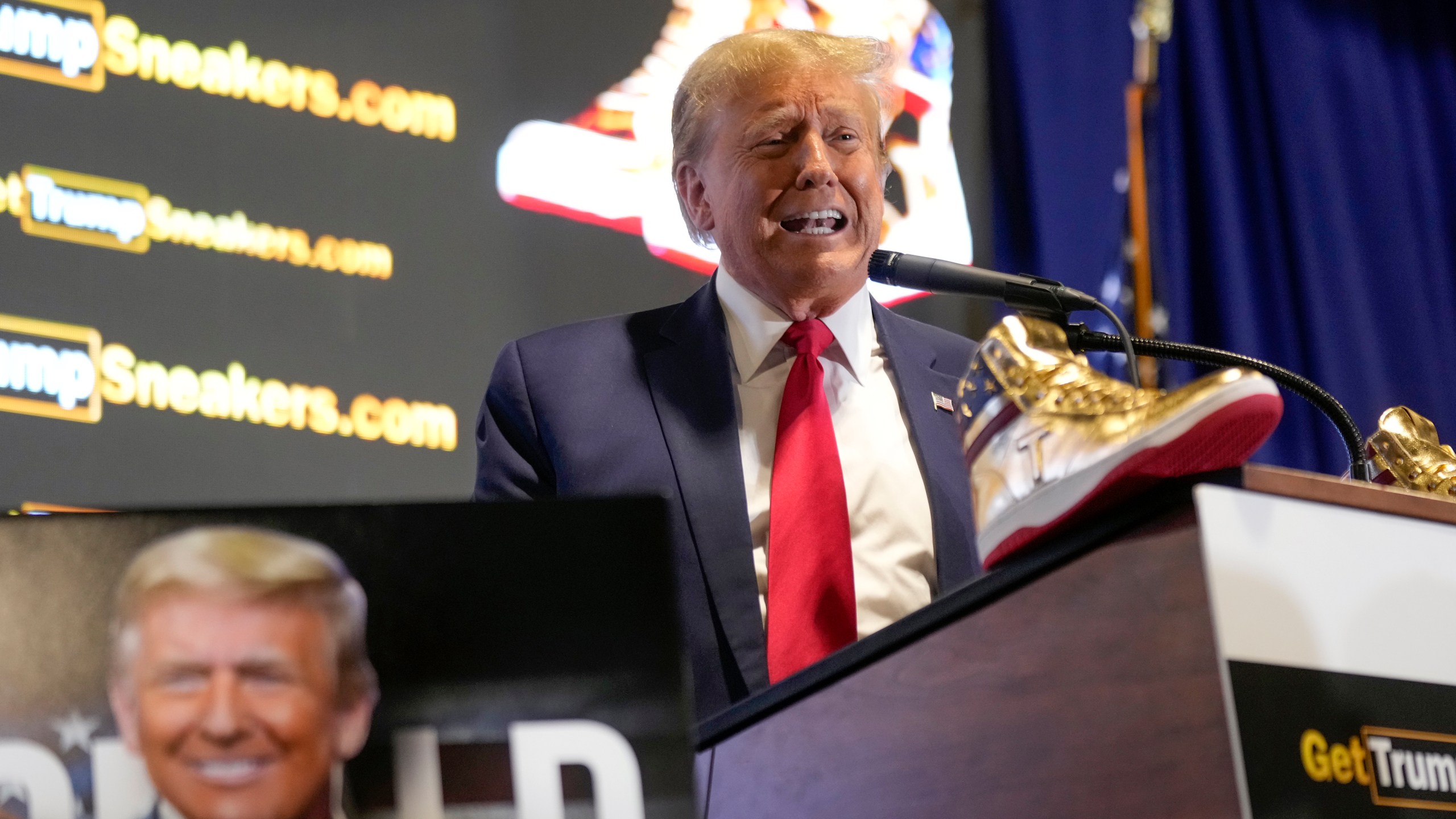 Republican presidential candidate former President Donald Trump attends Sneaker Con Philadelphia, an event popular among sneaker collectors, in Philadelphia, Saturday, Feb. 17, 2024. Trump announced a line of shoes bearing his name. (AP Photo/Manuel Balce Ceneta)