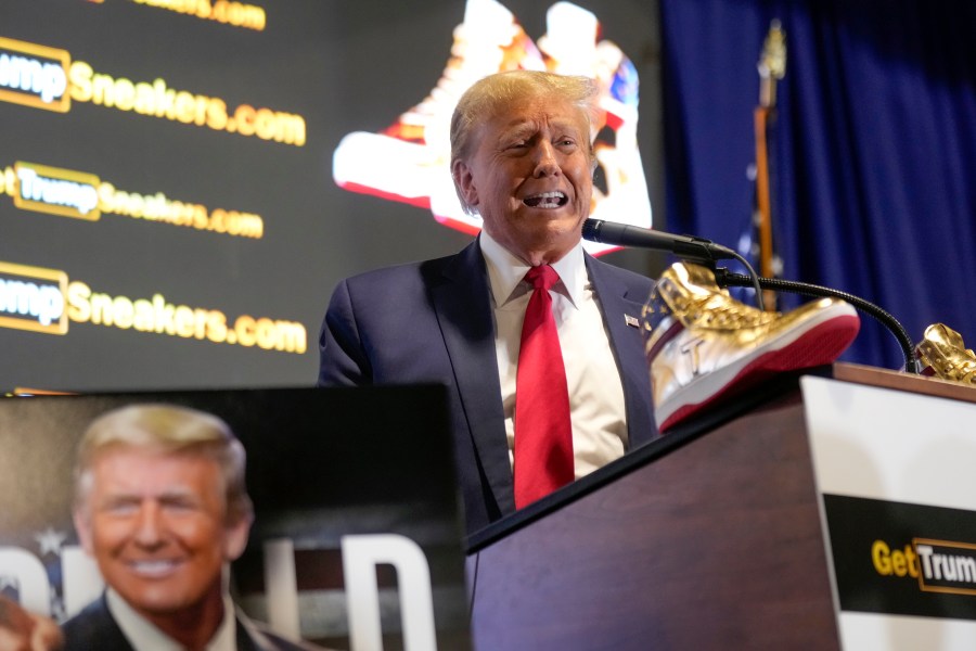 Republican presidential candidate former President Donald Trump attends Sneaker Con Philadelphia, an event popular among sneaker collectors, in Philadelphia, Saturday, Feb. 17, 2024. Trump announced a line of shoes bearing his name. (AP Photo/Manuel Balce Ceneta)