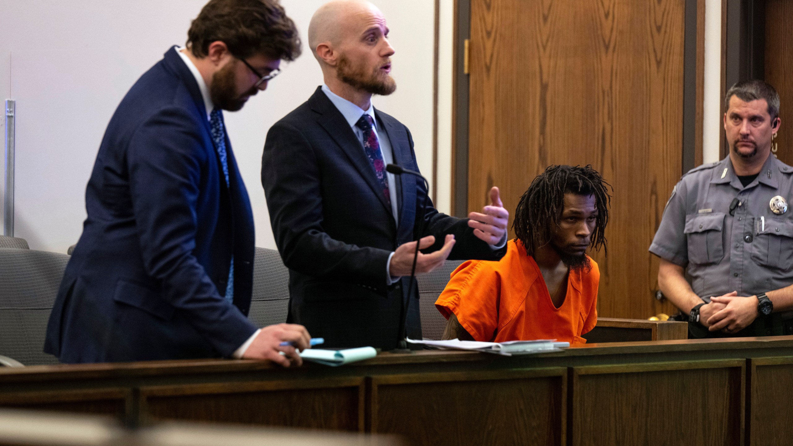 Nicholas Jordan sits in the jurors box as Nick Rogers, second left, from the Public Defenders Office, who is representing Jordan, addresses the court during Jordan first appearance at El Paso County 4th Judicial Court Friday, Feb. 23, 2024, in Colorado Springs Colo. Jordan was arrested Monday, Feb. 19, in the deaths of his roommate, Samuel Knopp, 24, and Celie Rain Montgomery, 26, at the University of Colorado Colorado Springs. (Parker Seibold/The Gazette via AP, Pool)