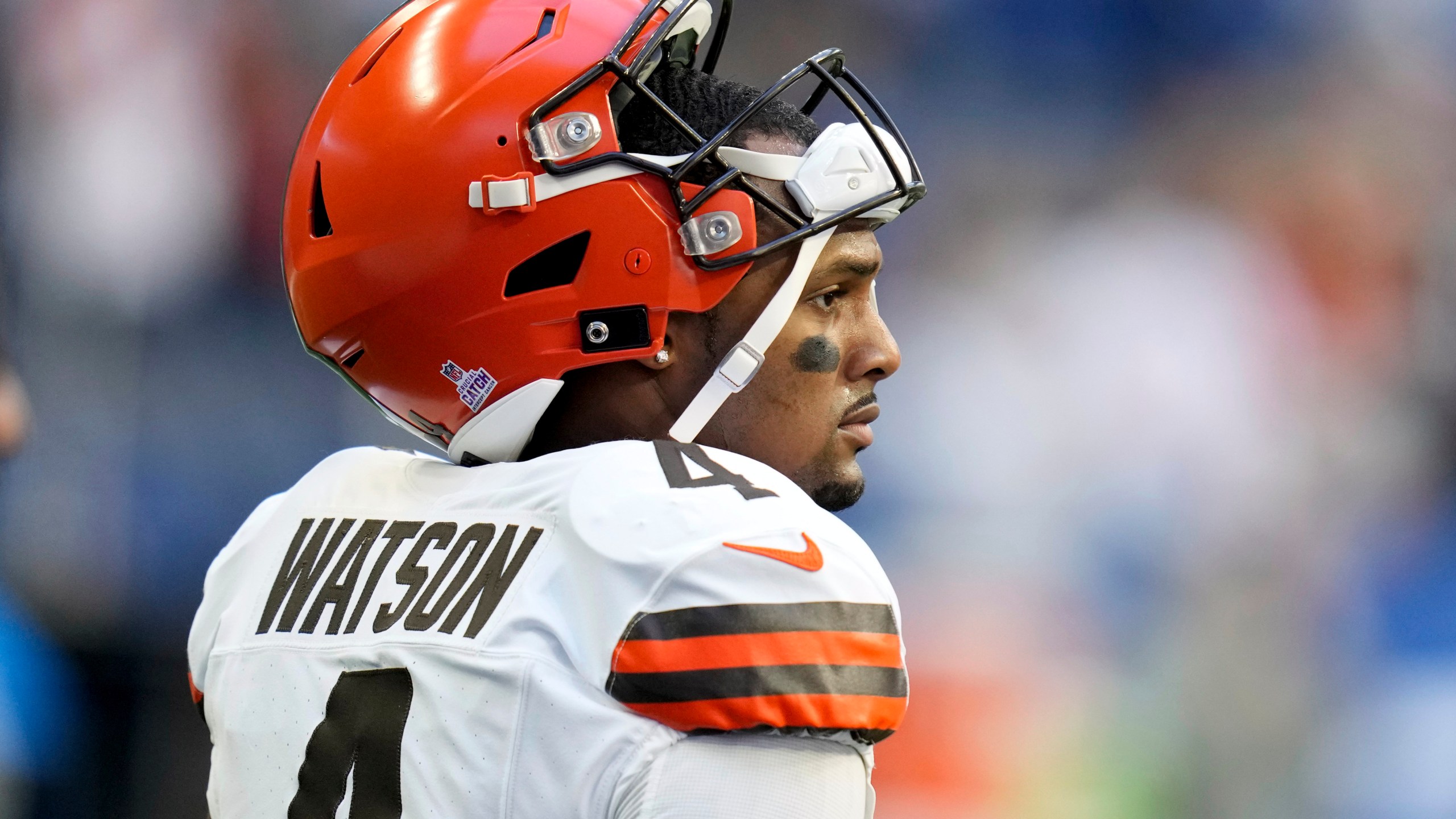 FILE - Cleveland Browns quarterback Deshaun Watson walks on the field before an NFL football game against the Indianapolis Colts, Sunday, Oct. 22, 2023, in Indianapolis. Watson will resume throwing next month following right shoulder surgery that cut short his second season with Cleveland after just six starts. (AP Photo/Michael Conroy, File)