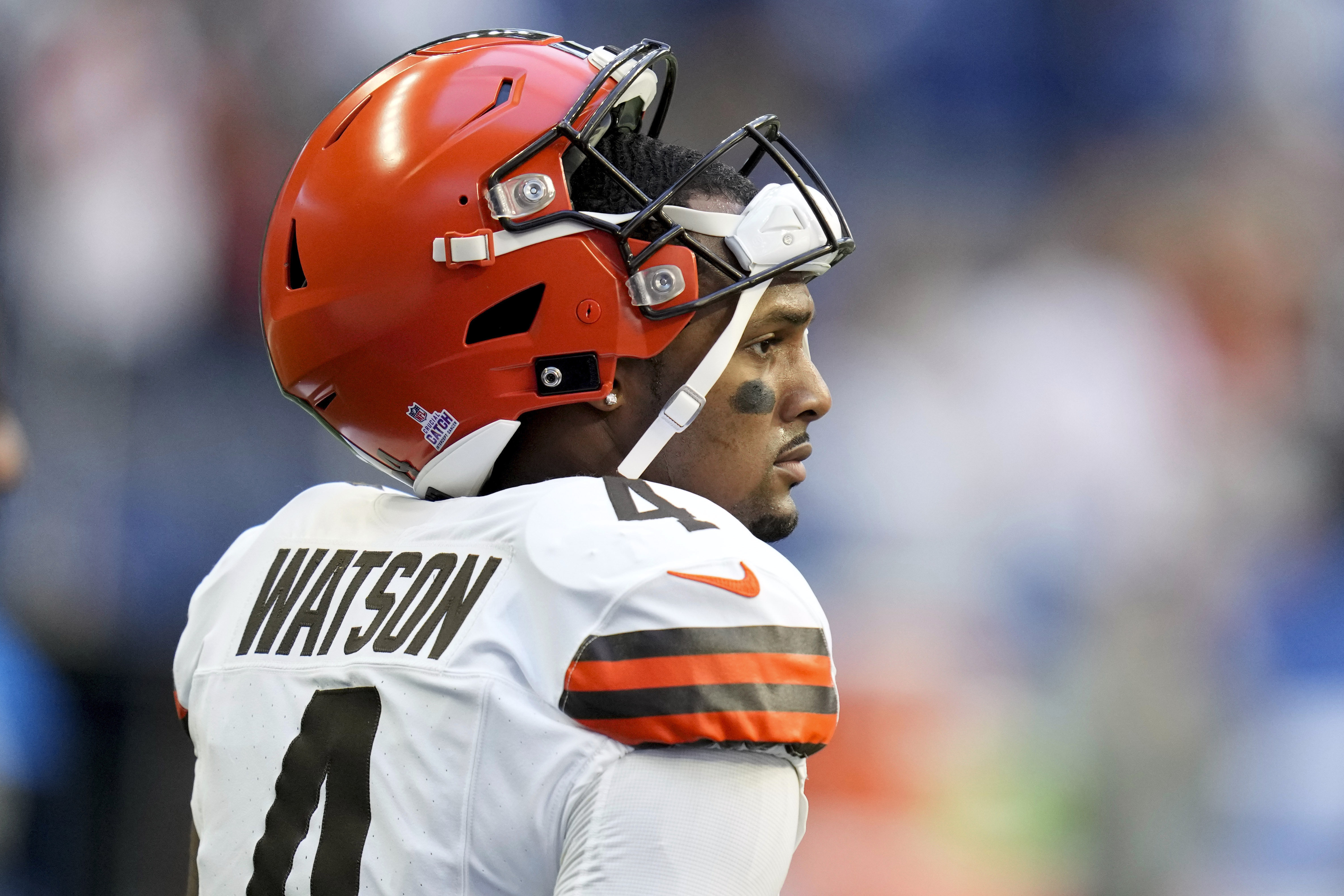 FILE - Cleveland Browns quarterback Deshaun Watson walks on the field before an NFL football game against the Indianapolis Colts, Sunday, Oct. 22, 2023, in Indianapolis. Watson will resume throwing next month following right shoulder surgery that cut short his second season with Cleveland after just six starts. (AP Photo/Michael Conroy, File)