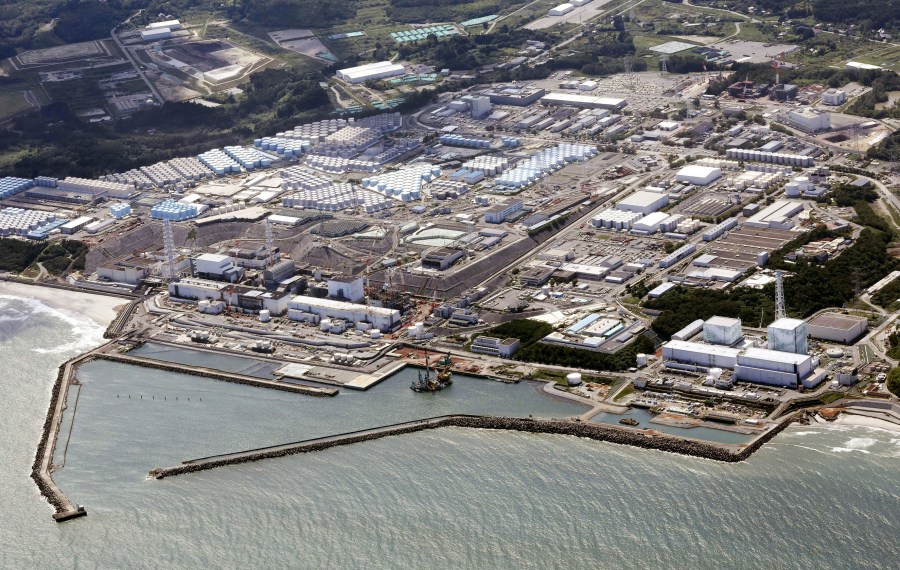 FILE - This aerial view shows the wrecked Fukushima Daiichi nuclear power plant in Okuma town, northeastern Japan, on Aug. 24, 2023. A drone small enough to fit in one's hand flew inside one of the damaged reactors at the wrecked nuclear power plant Wednesday, Feb. 28, 2024, in hopes it can examine some of the molten fuel debris in areas where earlier robots failed to reach. (Kyodo News via AP, File)