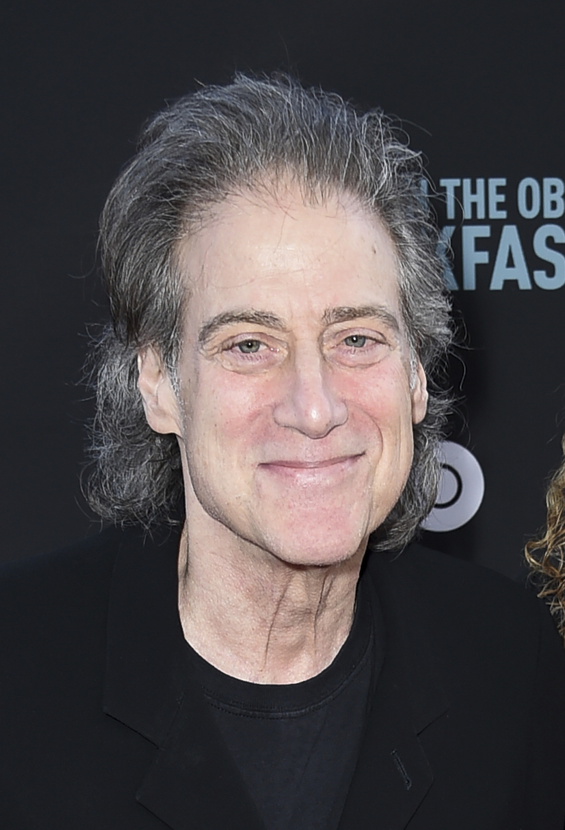 FILE - Richard Lewis appears at the premiere of "If You're Not In The Obit, Eat Breakfast" in Beverly Hills, Calif., on May 17, 2017. Lewis, an acclaimed comedian known for exploring his neuroses in frantic, stream-of-consciousness diatribes while dressed in all-black, leading to his nickname “The Prince of Pain,” has died. He was 76. He died at his home in Los Angeles on Tuesday night after suffering a heart attack, according to his publicist Jeff Abraham. (Photo by Richard Shotwell/Invision/AP, File)