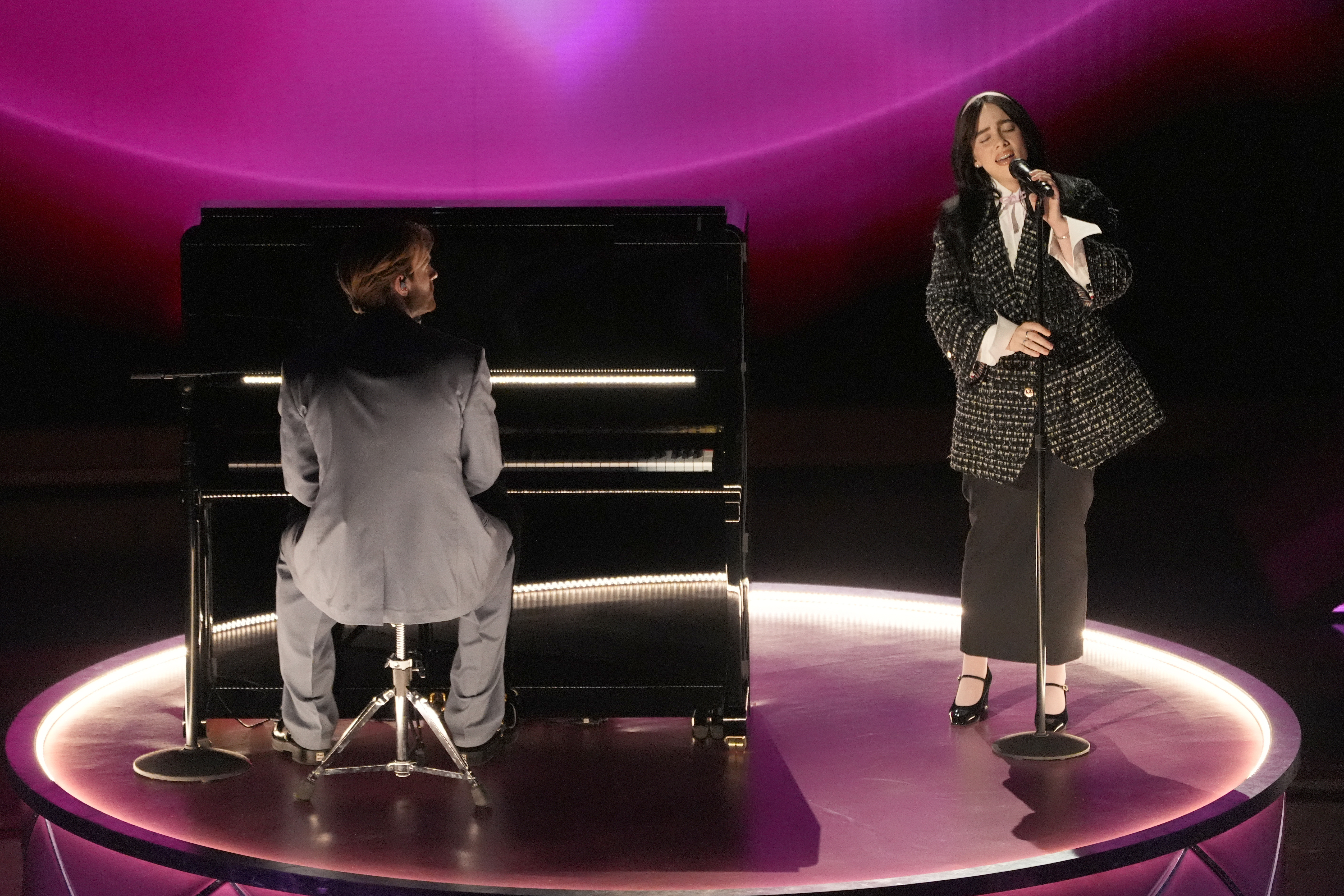 Finneas, left, and Billie Eilish perform "What Was I Made For?" from "Barbie" during the Oscars on Sunday, March 10, 2024, at the Dolby Theatre in Los Angeles. (AP Photo/Chris Pizzello)
