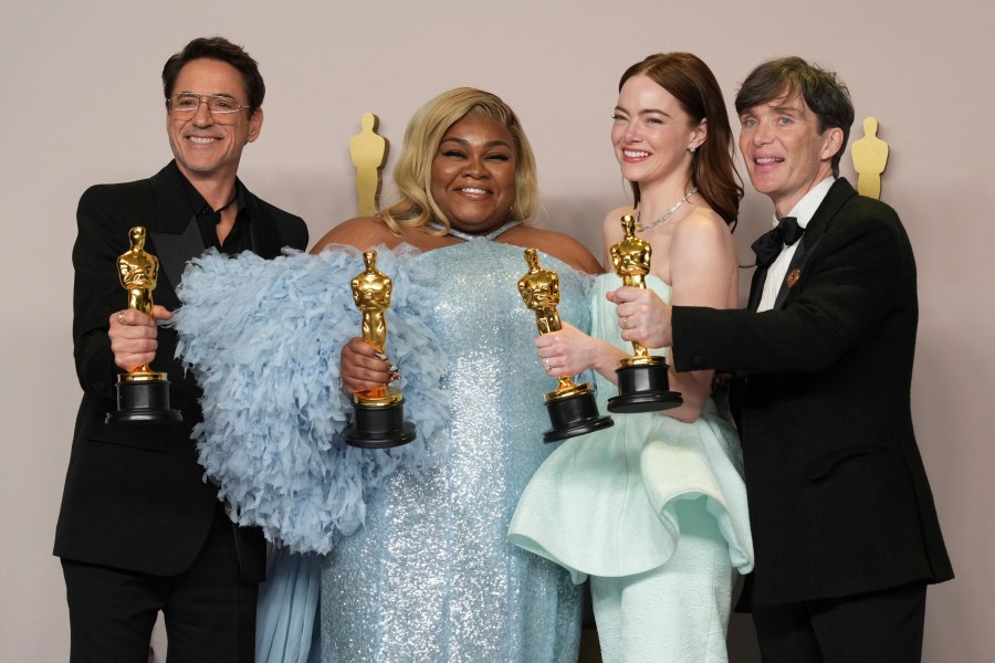 Robert Downey Jr., winner of the award for best performance by an actor in a supporting role for "Oppenheimer," from left, Da'Vine Joy Randolph, winner of the award for best performance by an actress in a supporting role for "The Holdovers," Emma Stone, winner of the award for best performance by an actress in a leading role for "Poor Things," and Cillian Murphy, winner of the award for best performance by an actor in a leading role for "Oppenheimer," pose in the press room at the Oscars on Sunday, March 10, 2024, at the Dolby Theatre in Los Angeles. (Photo by Jordan Strauss/Invision/AP)