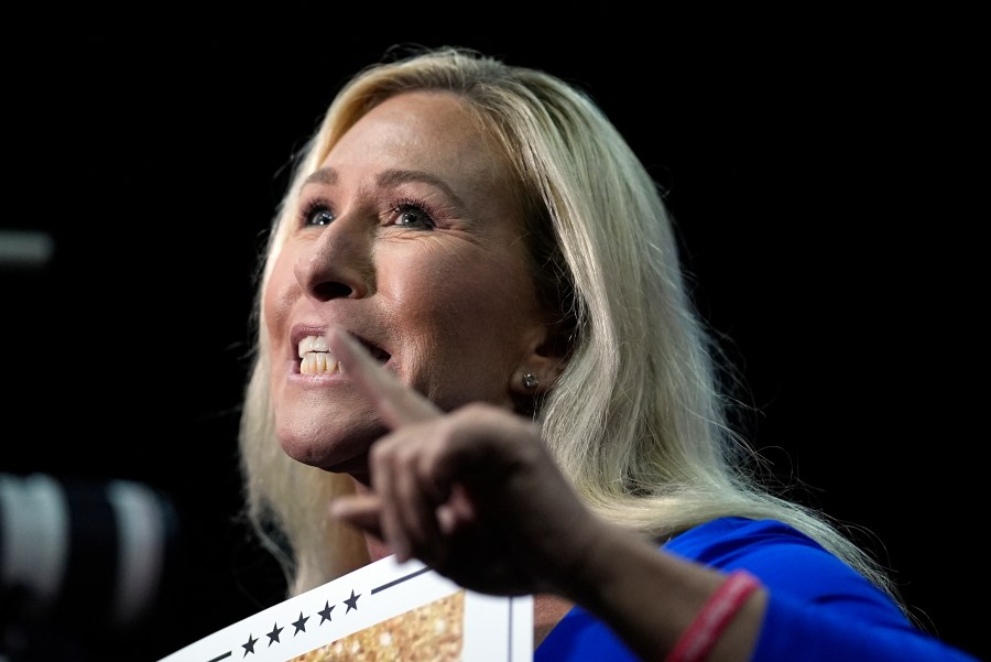 FILE - Rep. Marjorie Taylor Greene, R-Ga., talks at a campaign rally March 9, 2024, in Rome Ga. House Speaker Mike Johnson is at risk of being ousted. Greene filed a “motion to vacate” Friday, March 22, in the middle of a House vote on a $1.2 trillion package to keep the government open. (AP Photo/Mike Stewart, File)