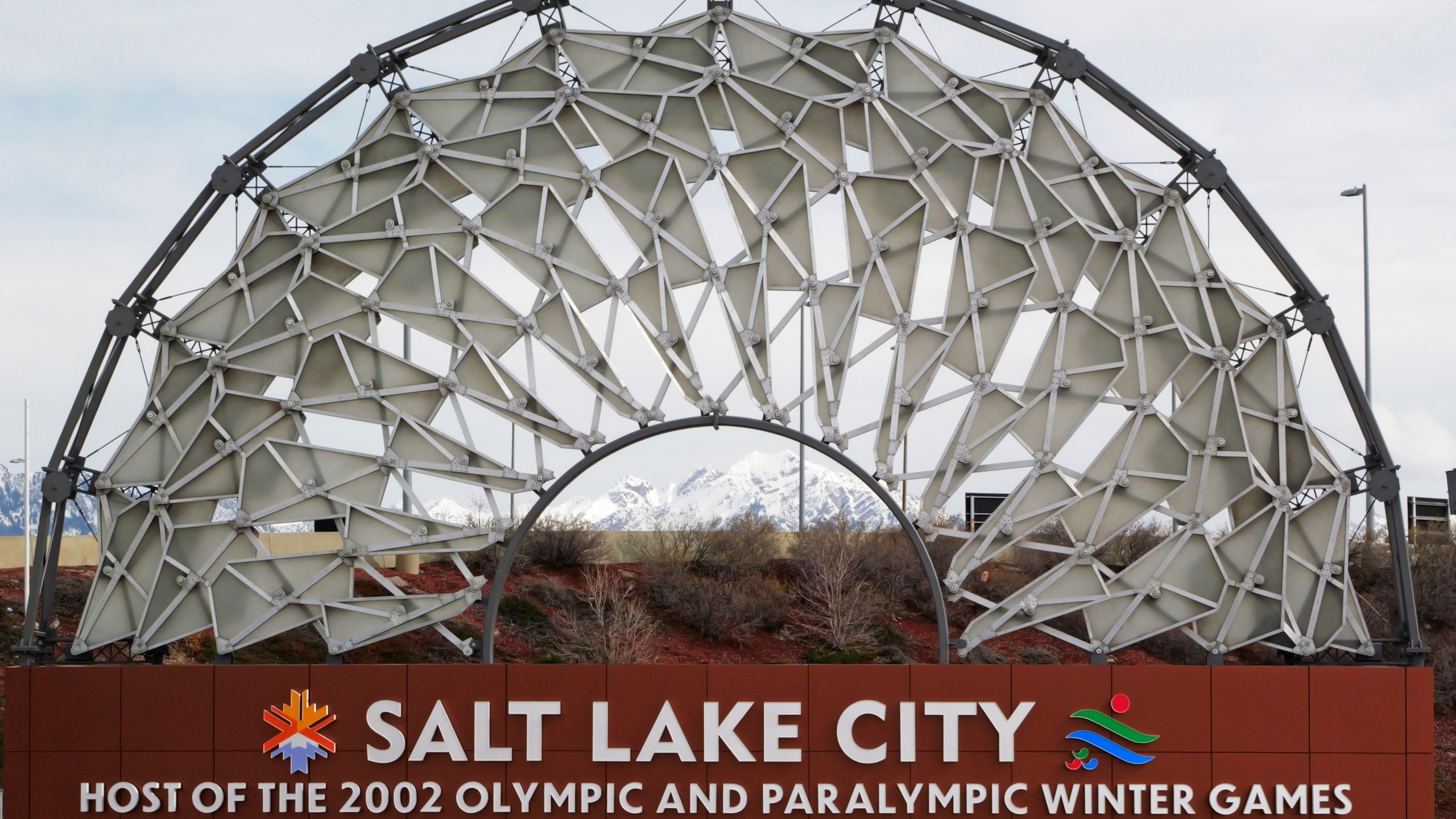 The iconic symbol of Salt Lake City's 2002 Winter Olympics greets travelers at the Salt Lake City International Airport Friday, Feb. 18, 2023, in Salt Lake City. Salt Lake City's enduring enthusiasm for hosting the Olympics will be on full display Wednesday, April 10, 2024, when members of the International Olympic Committee come to Utah for a site visit ahead of a formal announcement expected this July to name Salt Lake City the host for the 2034 Winter Olympics. (AP Photo/Rick Bowmer)