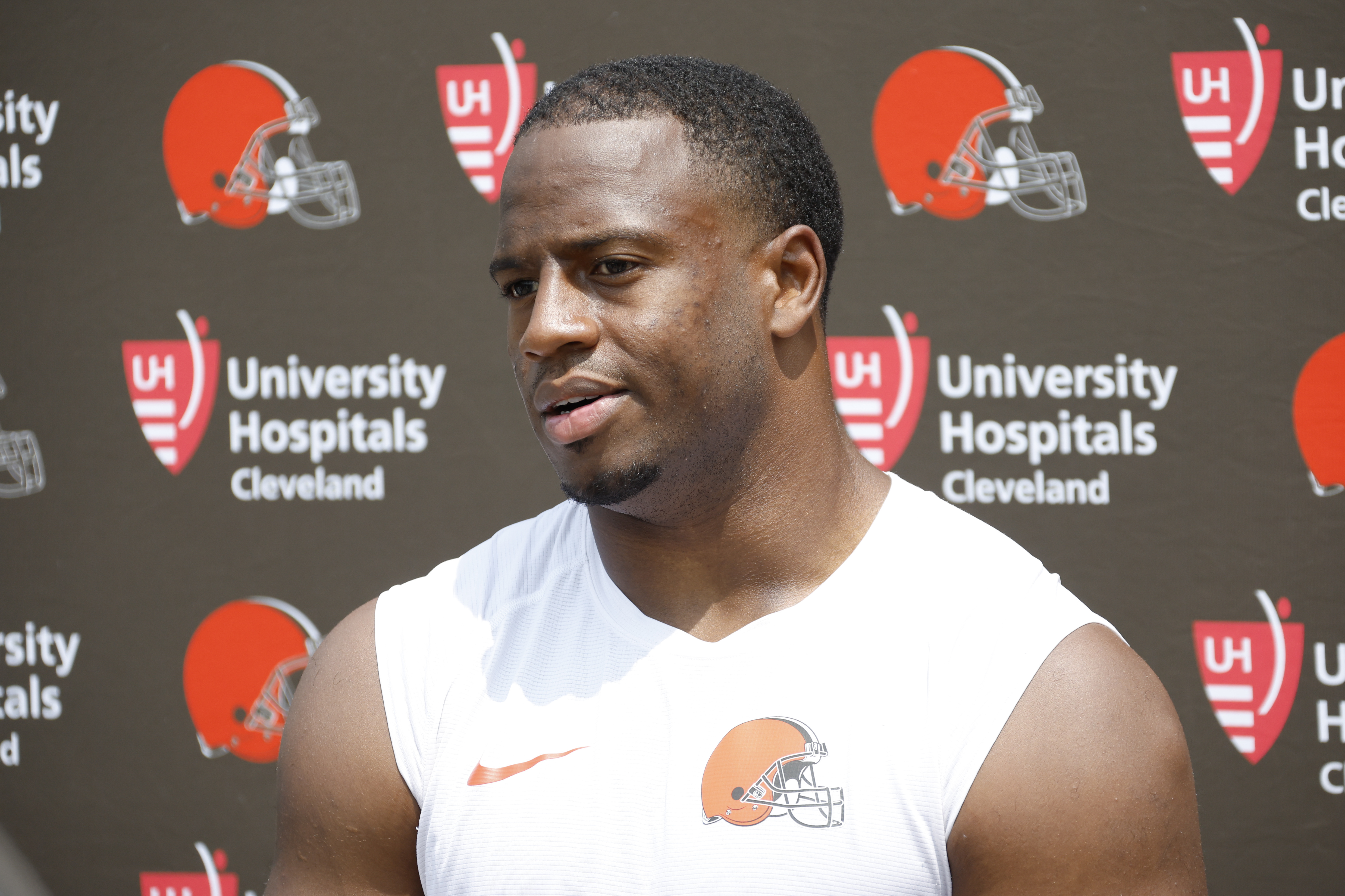 FILE - Cleveland Browns running back Nick Chubb answers a question during a press conference after practice at the NFL football team's practice facility Wednesday, June 7, 2023, in Berea, Ohio. The Cleveland Browns have restructured star running back Nick Chubb's contract as he continues to rehab after suffering a season-ending knee injury in 2023, a person familiar with the negotiations told the Associated Press on Thursday, April 11, 2024. (AP Photo/Ron Schwane, File)