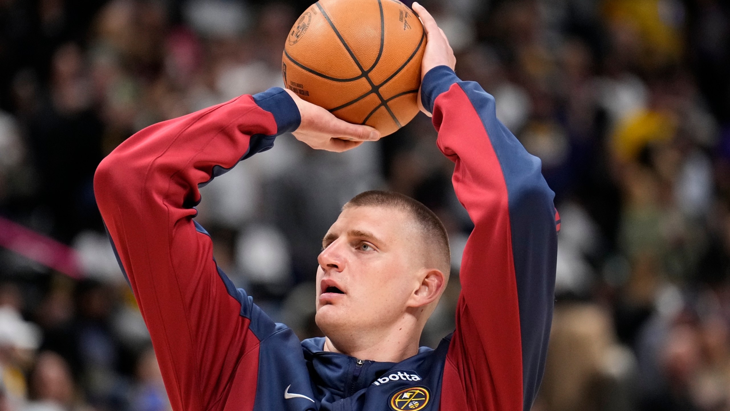 Denver Nuggets center Nikola Jokic warms up prior to Game 1 of an NBA basketball first-round play off game against the Los Angeles Lakers, Saturday, April 20, 2024, in Denver. (AP Photo/Jack Dempsey)