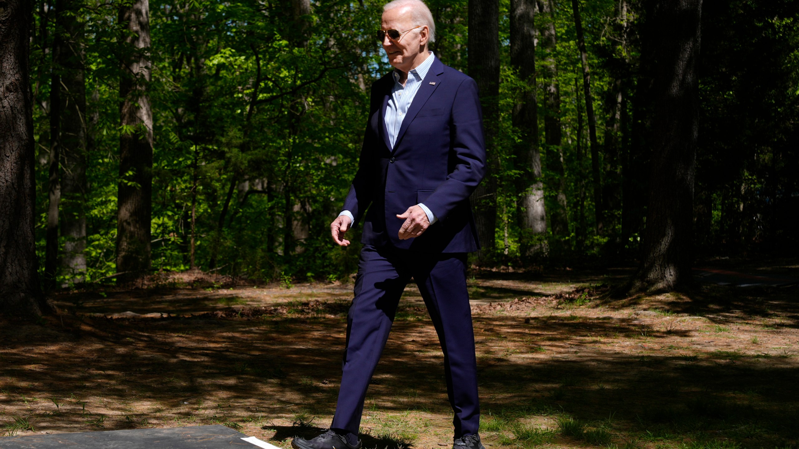 President Joe Biden arrives to speak at Prince William Forest Park on Earth Day, Monday, April 22, 2024, in Triangle, Va. Biden is announcing $7 billion in federal grants to provide residential solar projects serving low- and middle-income communities and expanding his American Climate Corps green jobs training program. (AP Photo/Manuel Balce Ceneta)