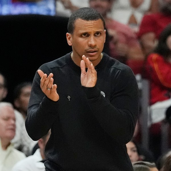 Boston Celtics head coach Joe Mazzulla claps during the second half of Game 4 of an NBA basketball first-round playoff series against the Miami Heat, Monday, April 29, 2024, in Miami. (AP Photo/Marta Lavandier)