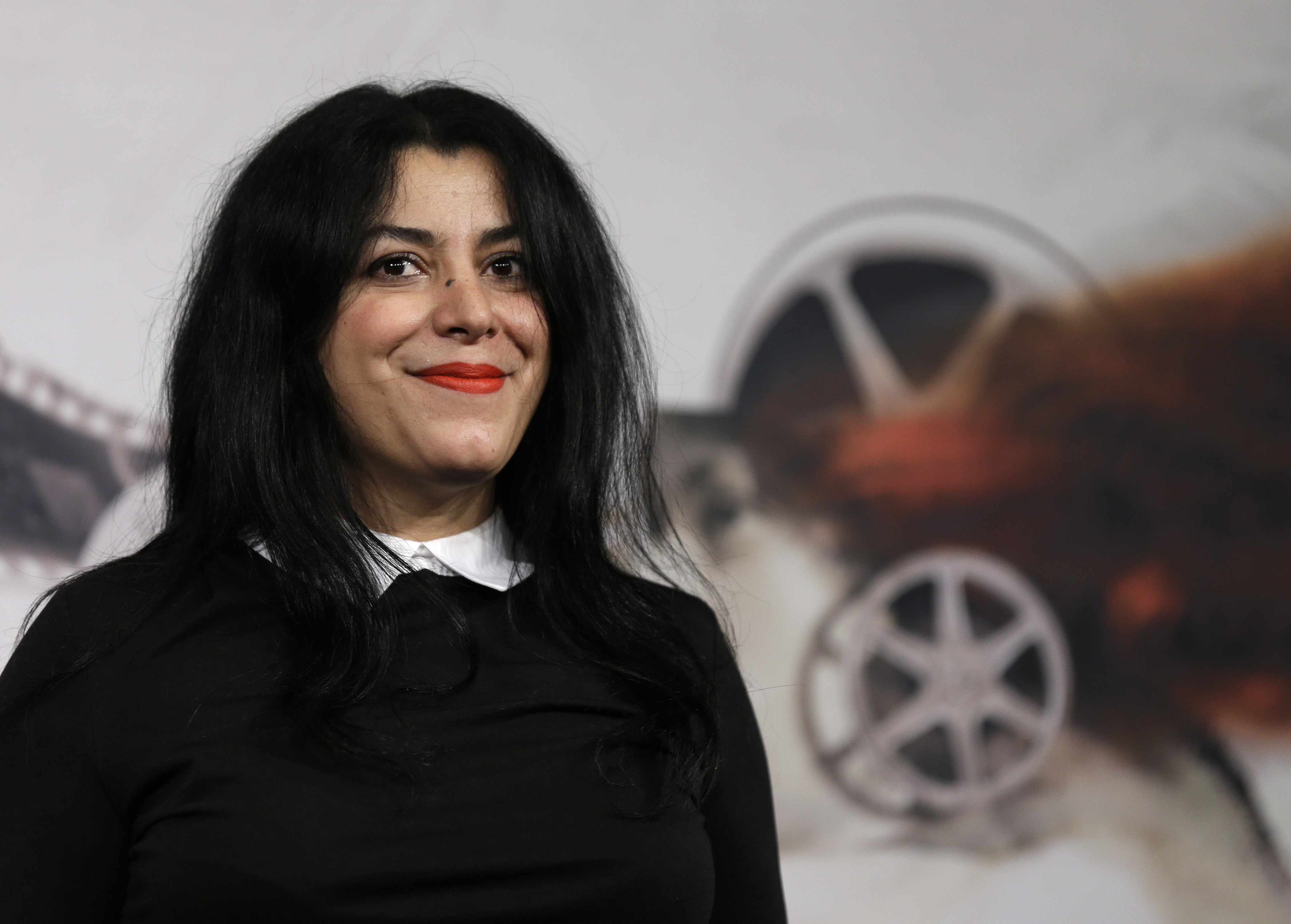 FILE - Director, illustrator and author Marjane Satrapi poses for photographers as she arrives to present the movie "La Bande des Jotas" at the 7th edition of the Rome International Film Festival in Rome, on Nov. 16, 2012. Marjane Satrapi, the acclaimed Iranian-French filmmaker and artist, has won the 2024 Princess of Asturias Foundation award for communication and humanities, the foundation announced Tuesday April 30, 2024. (AP Photo/Alessandra Tarantino, File)