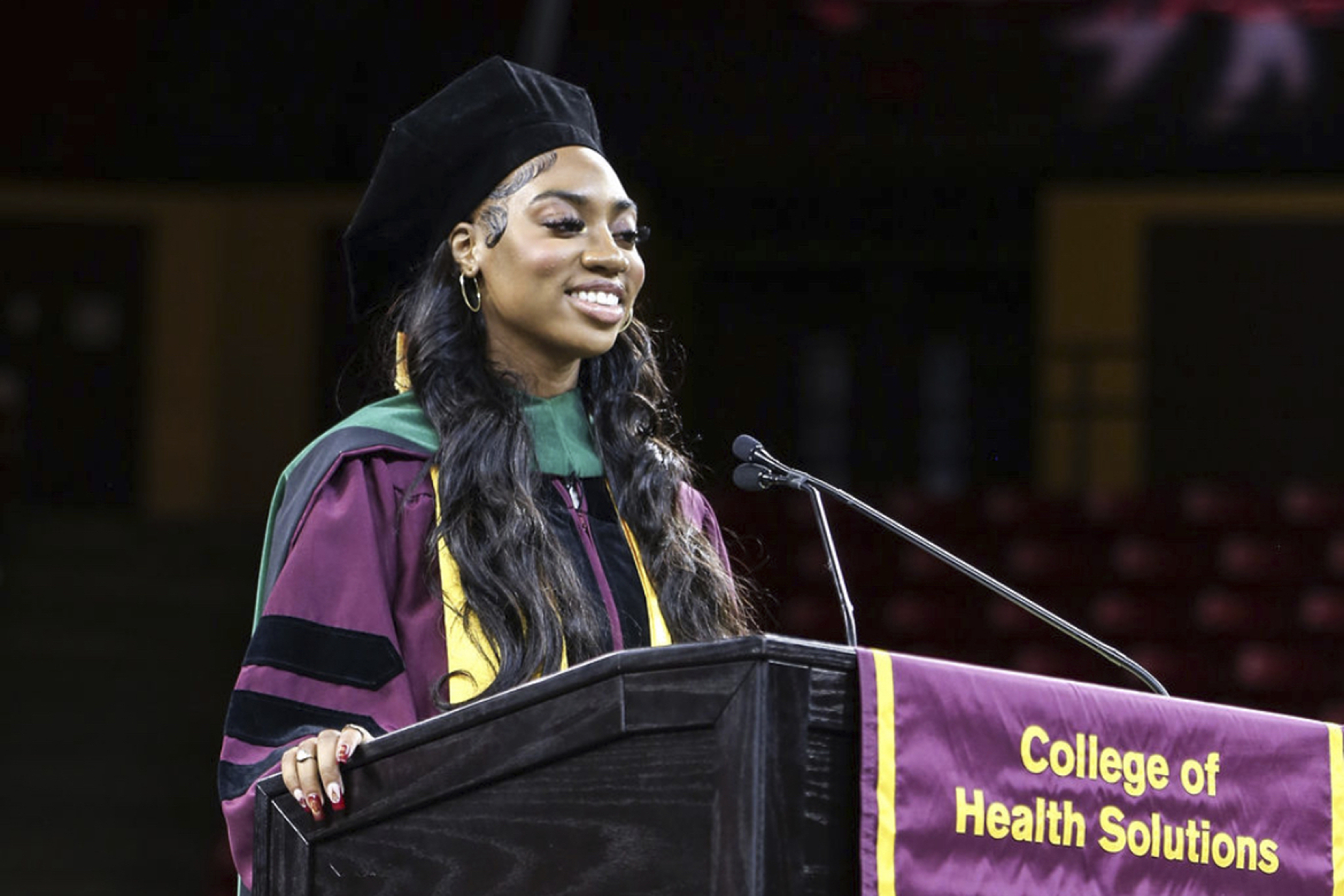 Dorothy Jean Tillman II participates in Arizona State University’s commencement, May 6, 2024, in Tempe, Ariz. Tillman, 18, earned her doctoral degree in integrated behavioral health in December at age 17 from the school. Tillman, of Chicago, began taking college courses at age 10. She earned her associate's, bachelor's and master's degrees before she turned 17. (Tillman Family via AP)