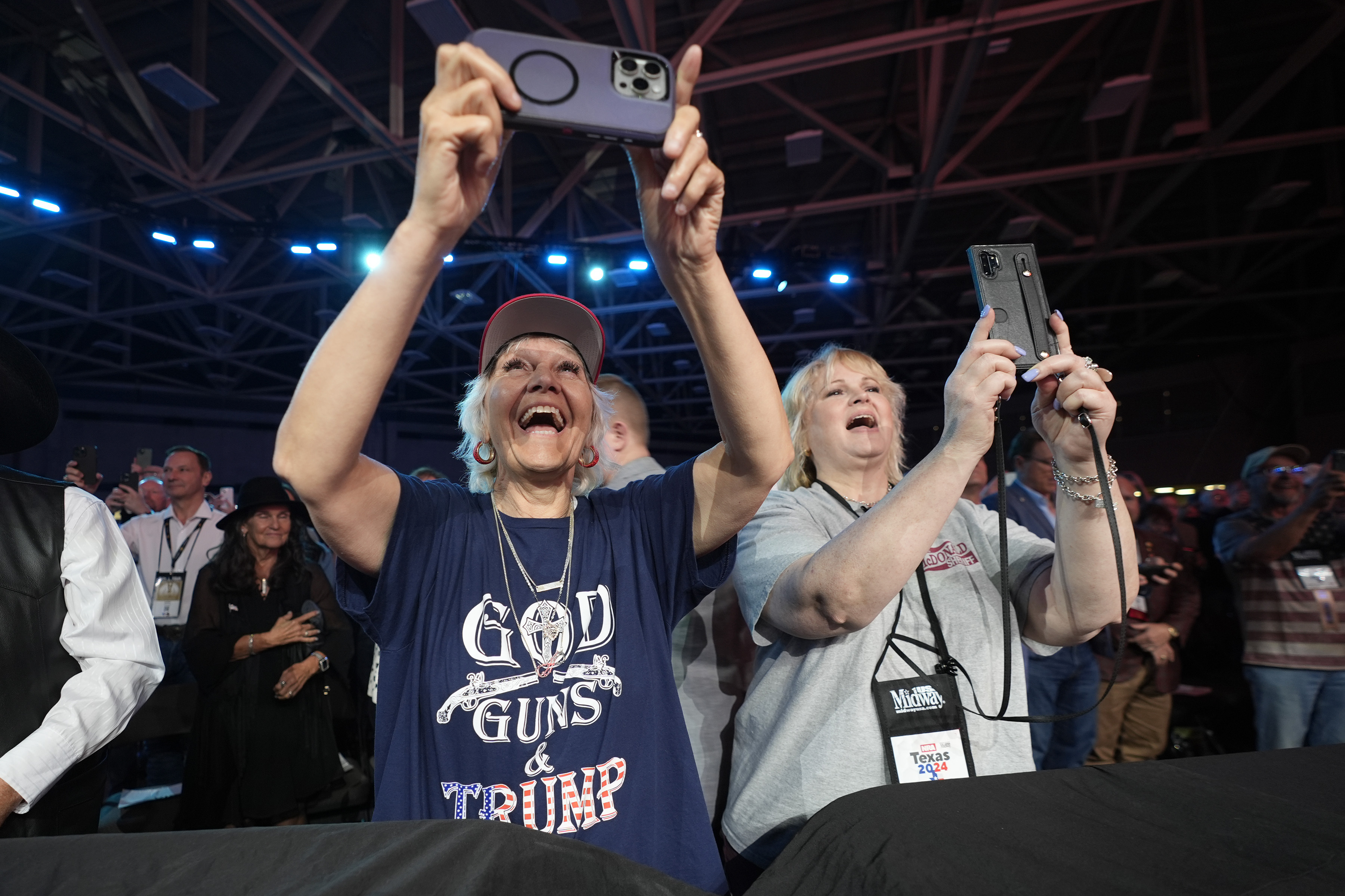 Supporters cheer for former President Donald Trump before he speaks at the National Rifle Association Convention, Saturday, May 18, 2024, in Dallas. (AP Photo/LM Otero)