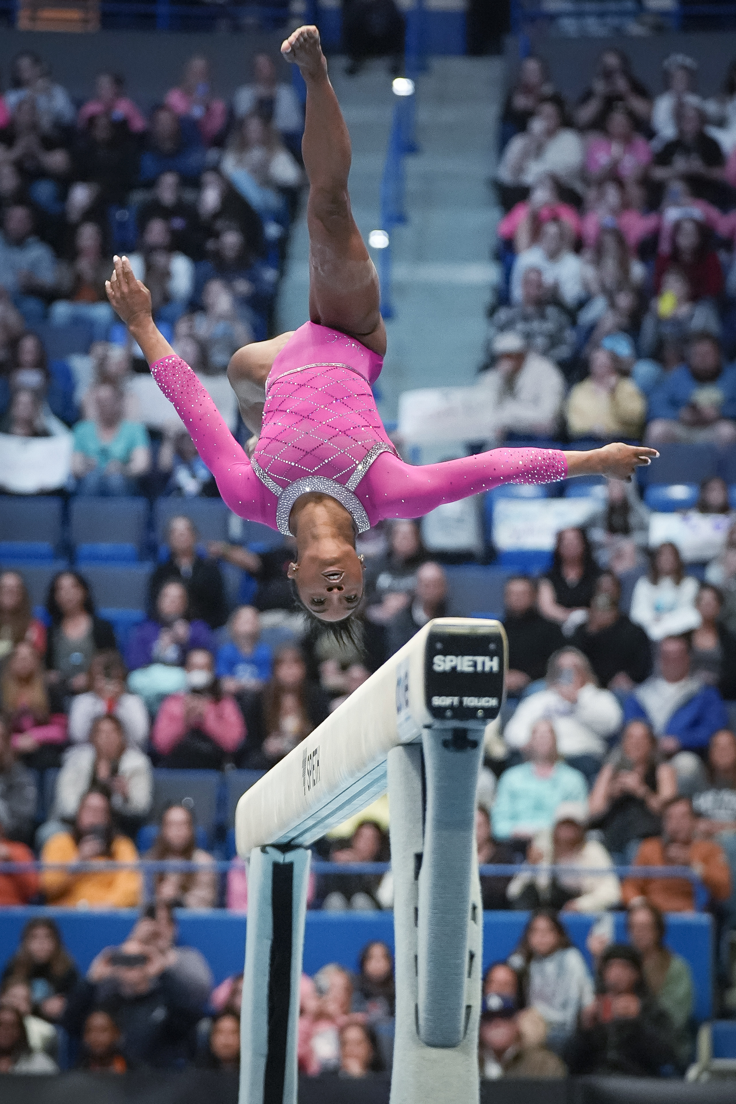 Simone Biles competes on the balance beam during the U.S. Classic gymnastics event Saturday, May 18, 2024, in Hartford, Conn. (AP Photo/Bryan Woolston)