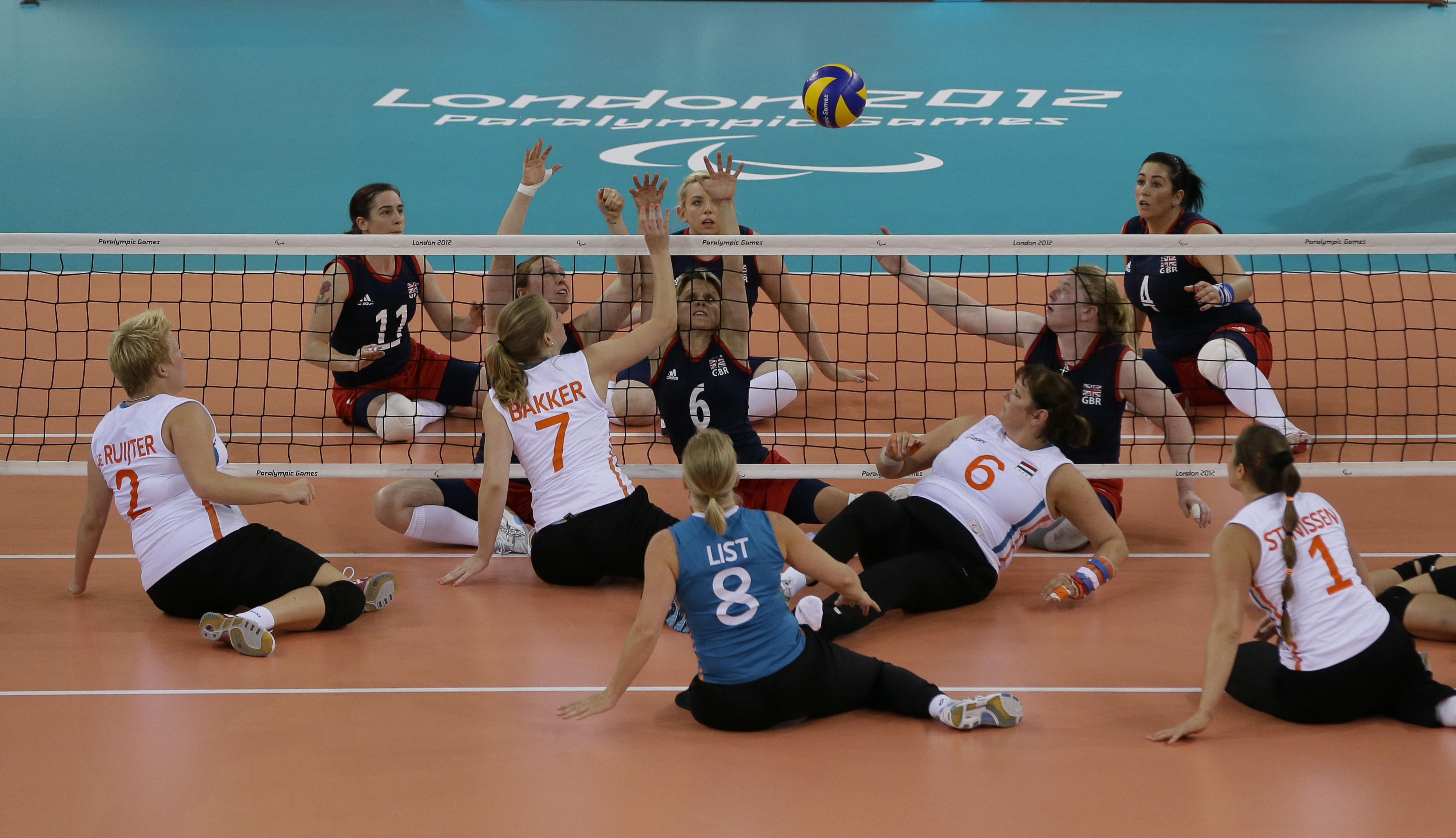 The Britain versus Netherlands sitting volleyball preliminary match at the 2012 Paralympics, on Sept. 1, 2012, in London. Netherlands won the match. With an assist from Paul McCartney, the Paralympic Games starts its 100-day race Monday to the opening ceremony in Paris in August(AP Photo/Kirsty Wigglesworth)