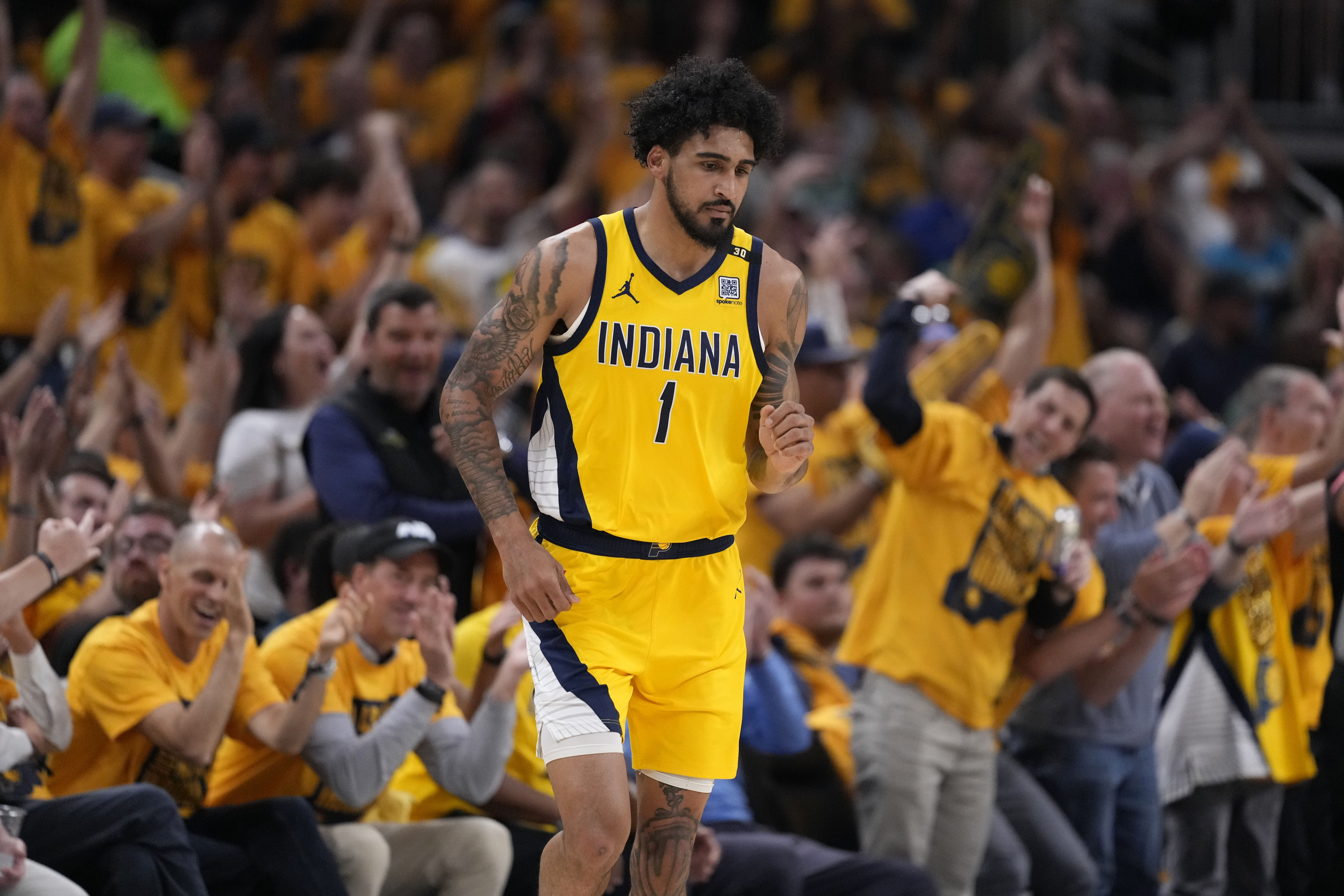 Indiana Pacers forward Obi Toppin (1) celebrates after making a basket during the first half of Game 4 of the NBA Eastern Conference basketball finals against the Boston Celtics, Monday, May 27, 2024, in Indianapolis. (AP Photo/Michael Conroy)