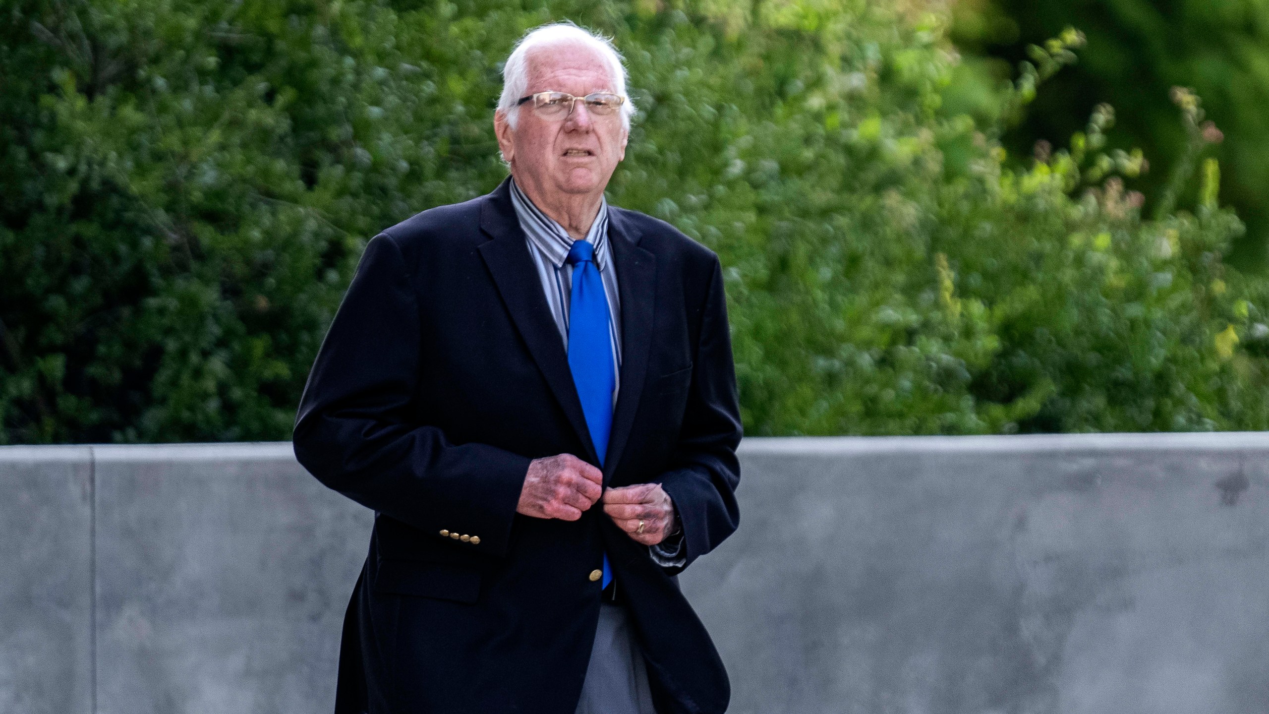 Orange County Superior Court Judge Jeffrey Ferguson walks out of court after attending a preliminary hearing in Los Angeles, Thursday, June 20, 2024. Ferguson is accused of killing his wife during an argument while drunk. (AP Photo/Damian Dovarganes)