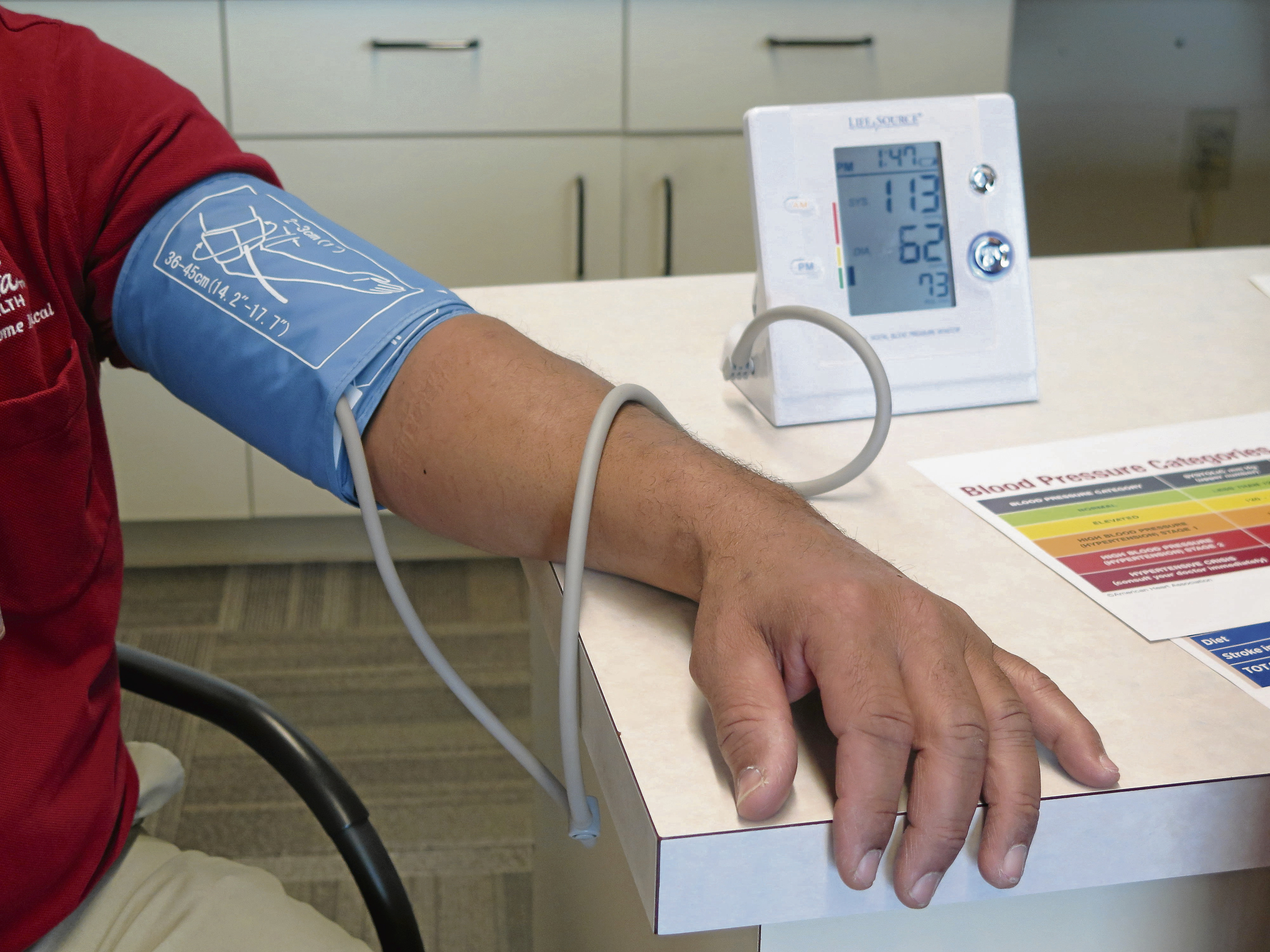 FILE - A Care Home Delivery Technician gets his blood pressure checked at Augusta Health in Fishersville, Va., on Wednesday, Feb. 6, 2019. Racial and ethnic inequities in health care are found in every state in the U.S. despite some progress over the past two decades, according to a new national report released Wednesday, June 26, 2024. (Rebecca J. Barnab/The News Virginian via AP, File)