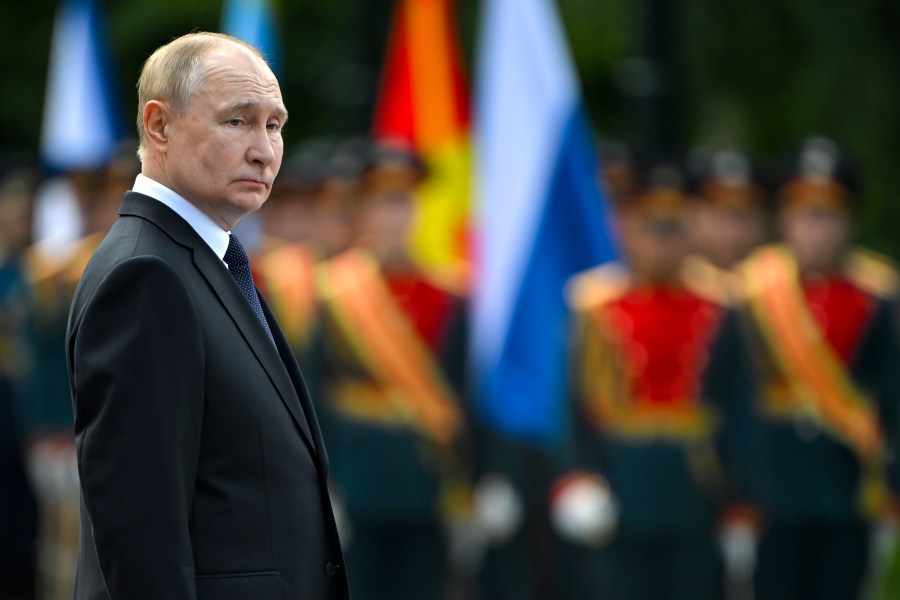 FILE - Russian President Vladimir Putin attends a wreath laying ceremony at the Tomb of Unknown Soldier near the Kremlin Wall in Moscow, Russia, on Saturday, June 22, 2024. Putin on Friday, June 28, 2024, called for resuming production of intermediate-range missiles that were banned under a now-scrapped treaty with the United States. (Sergei Guneyev, Sputnik, Kremlin Pool Photo via AP, File)
