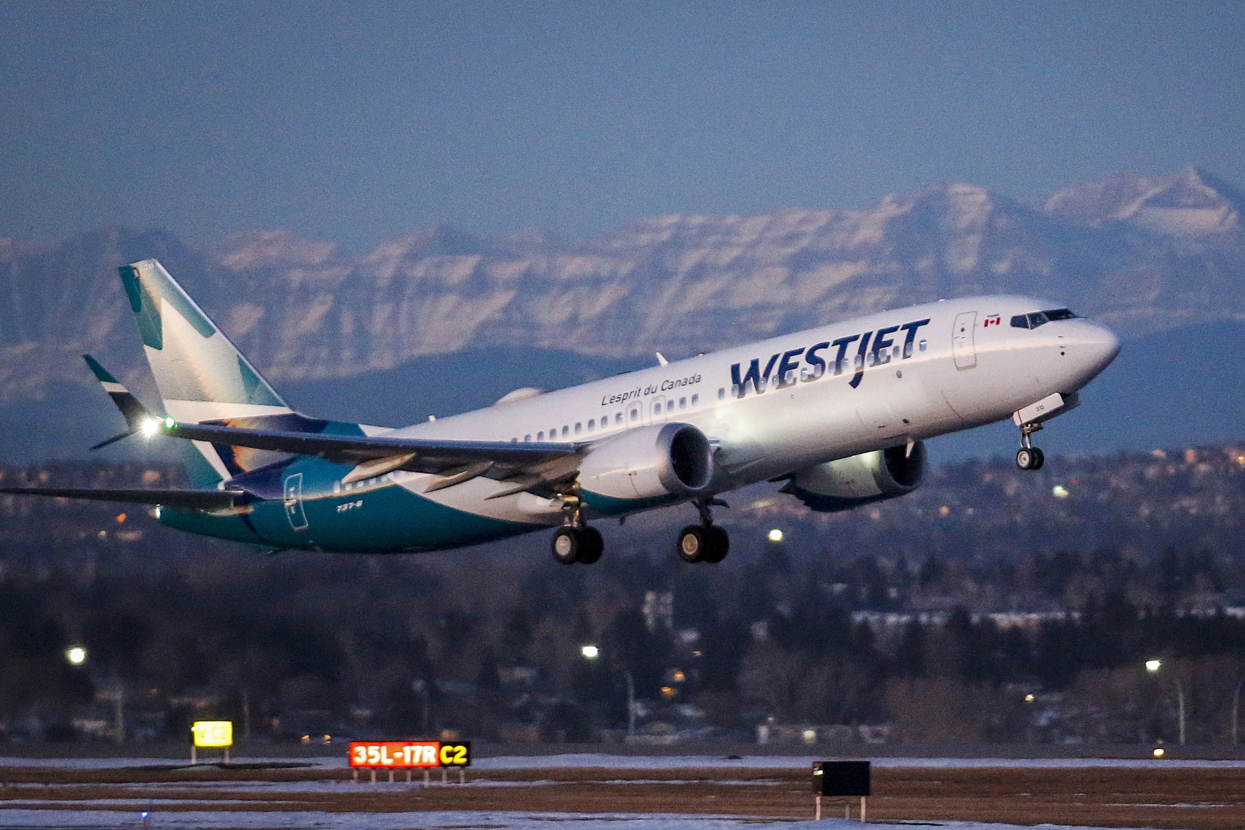 FILE - A westJet airplane takes off in Calgary, Alta., Jan. 21, 202. Mechanics at the Canadian airline WestJet say they are dropping plans to begin a strike now that the airline has agreed to resume negotiations on a new collective-bargaining agreement. Members of the Aircraft Mechanics Fraternal Association had been preparing to walk off the job on Thursday night. (Jeff McIntosh/The Canadian Press via AP, File)