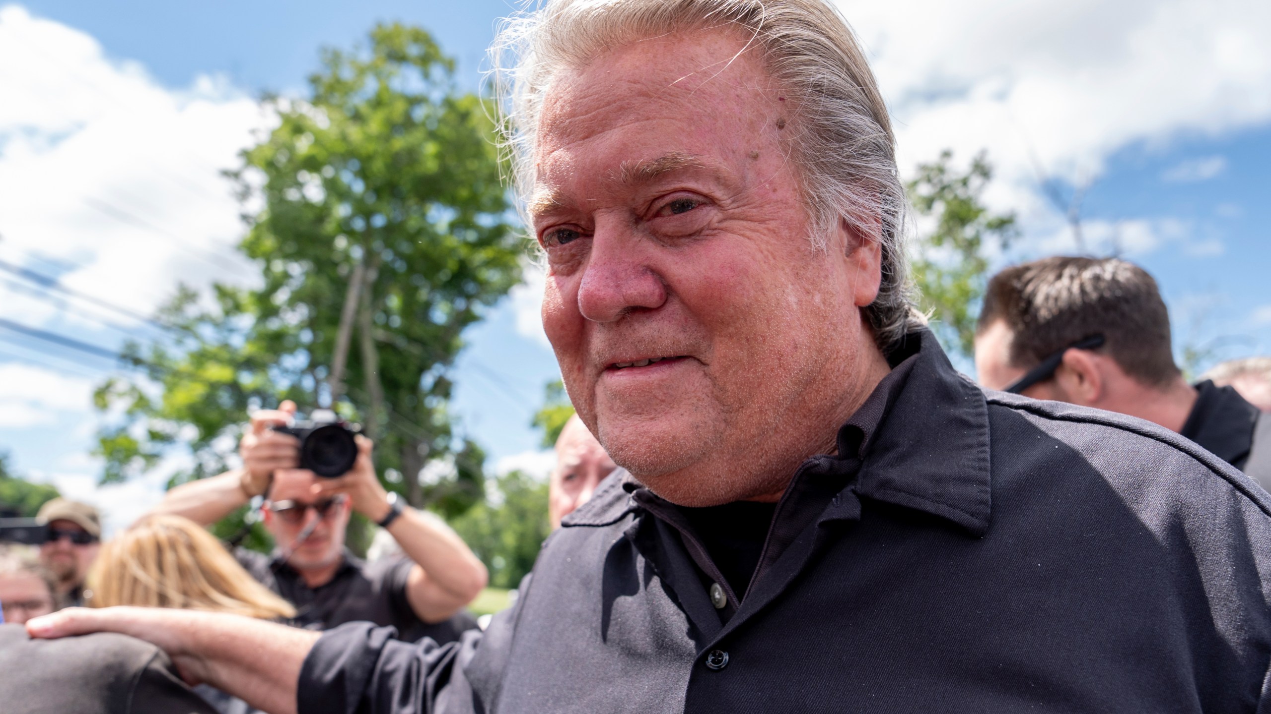 Steve Bannon arrives to speak outside Danbury Federal Correctional Institution, Monday, July 1, 2024, in Danbury, Conn. Bannon was taken into custody after surrendering at the federal prison to begin a four-month sentence on contempt charges for defying a subpoena in the congressional investigation into the U.S. Capitol attack. (AP Photo/Julia Nikhinson)