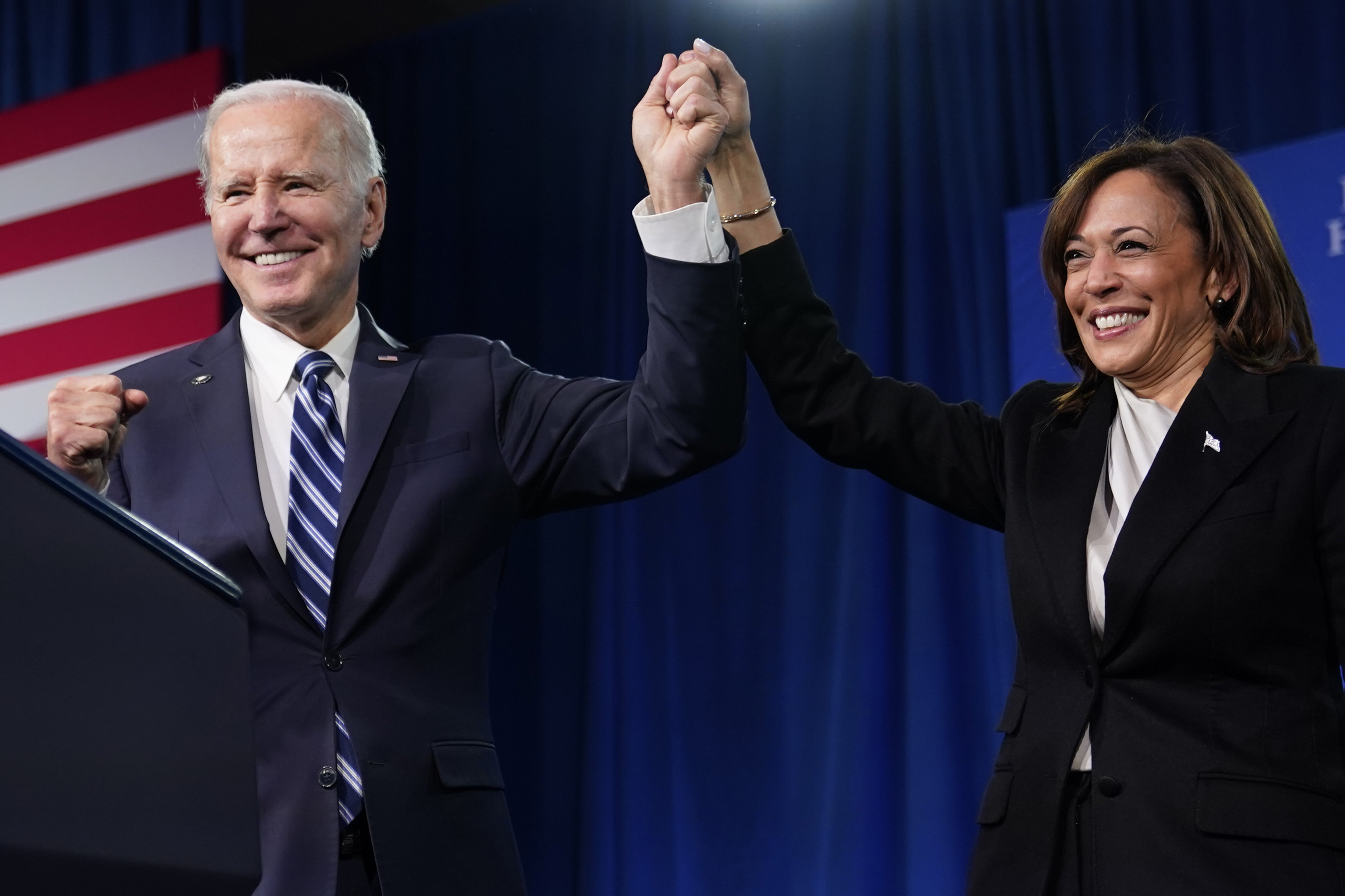 FILE - President Joe Biden and Vice President Kamala Harris stand on stage at the Democratic National Committee winter meeting, Feb. 3, 2023, in Philadelphia. Harris has been the White House's first line of defense after President Joe Biden's faltering performance in last week's debate with Donald Trump. (AP Photo/Patrick Semansky, File)
