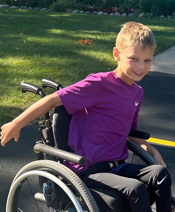 This undated photo provided by Jasculca Terman Strategic Communications shows Cooper Roberts, who was a victim of the 2022 Fourth of July parade shooting in Highland Park, Ill. He remains paralyzed from the waist down. Keely Roberts, the mother of the youngest victims of the Fourth of July parade shooting, which left one of her twin sons — now 10 — paralyzed from the waist down, will talk to the media Wednesday, July 3, 2024, about what it means to survive the horror two years later. (The Roberts Family/Jasculca Terman Strategic Communications via AP)